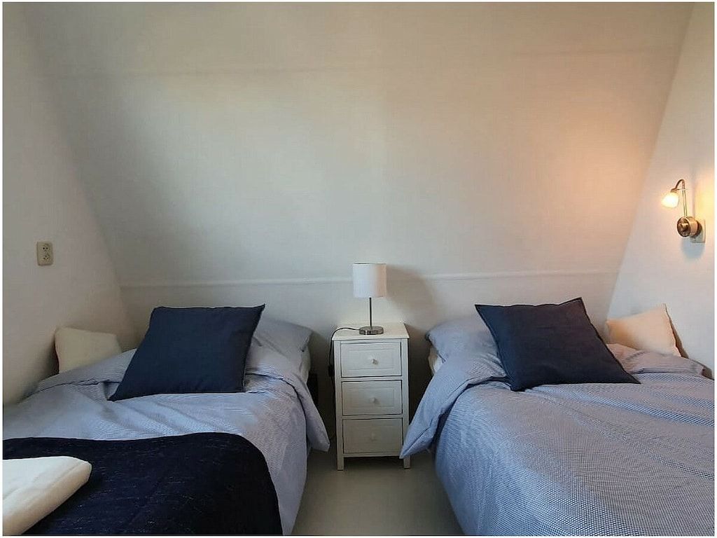Een slaapkamer van 343024 in Julianadorp