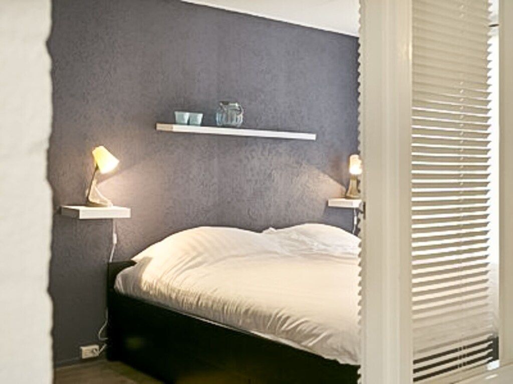 Een slaapkamer van 91078 in Ouddorp