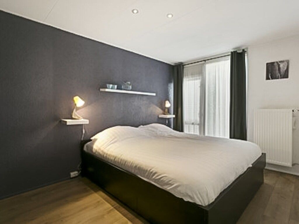 Een slaapkamer van 91078 in Ouddorp