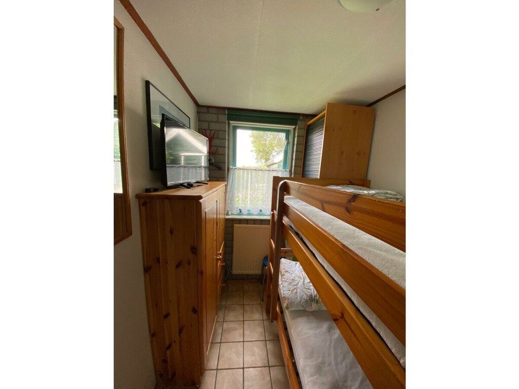 Een slaapkamer van 297331 in Dirkshorn