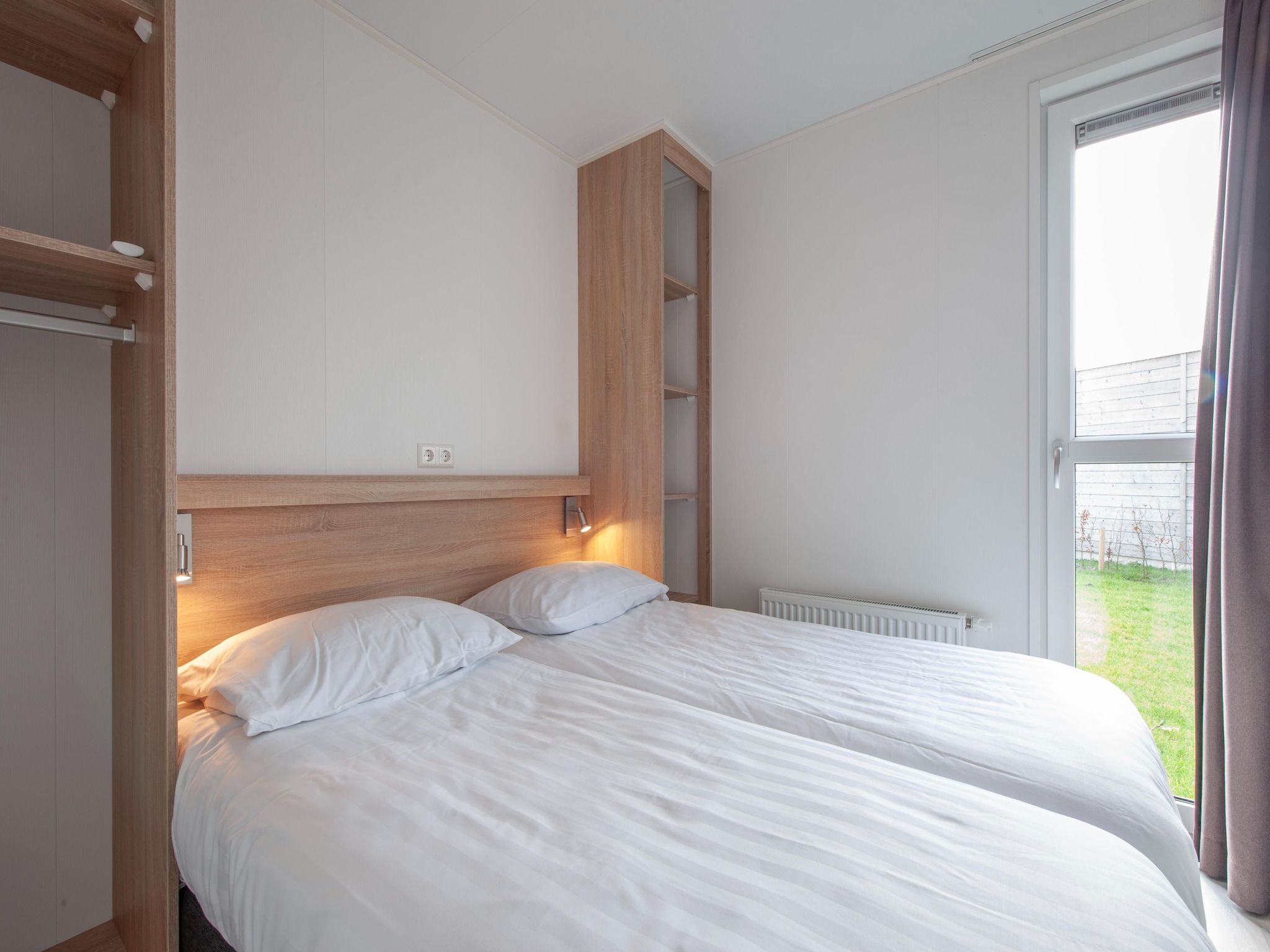 Een slaapkamer van Beach Resort Nieuwvliet-Bad 18 in Nieuwvliet-Bad