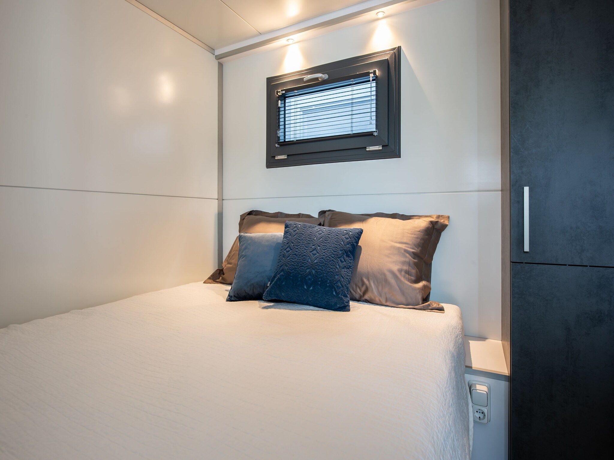 Een slaapkamer van Waterlodge Blue Island in Kamperland
