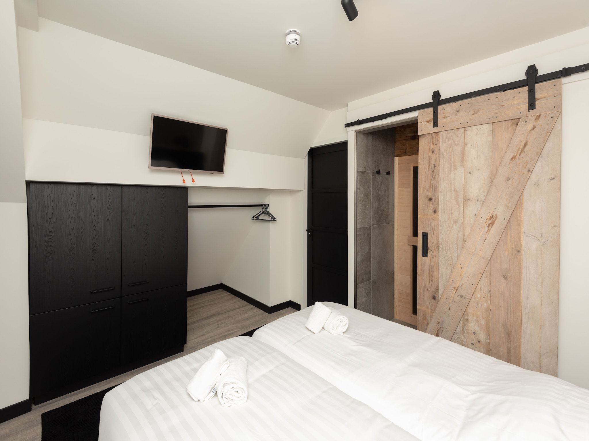 Een slaapkamer van Jan van Renesseweg 1 - 2 pax in Renesse