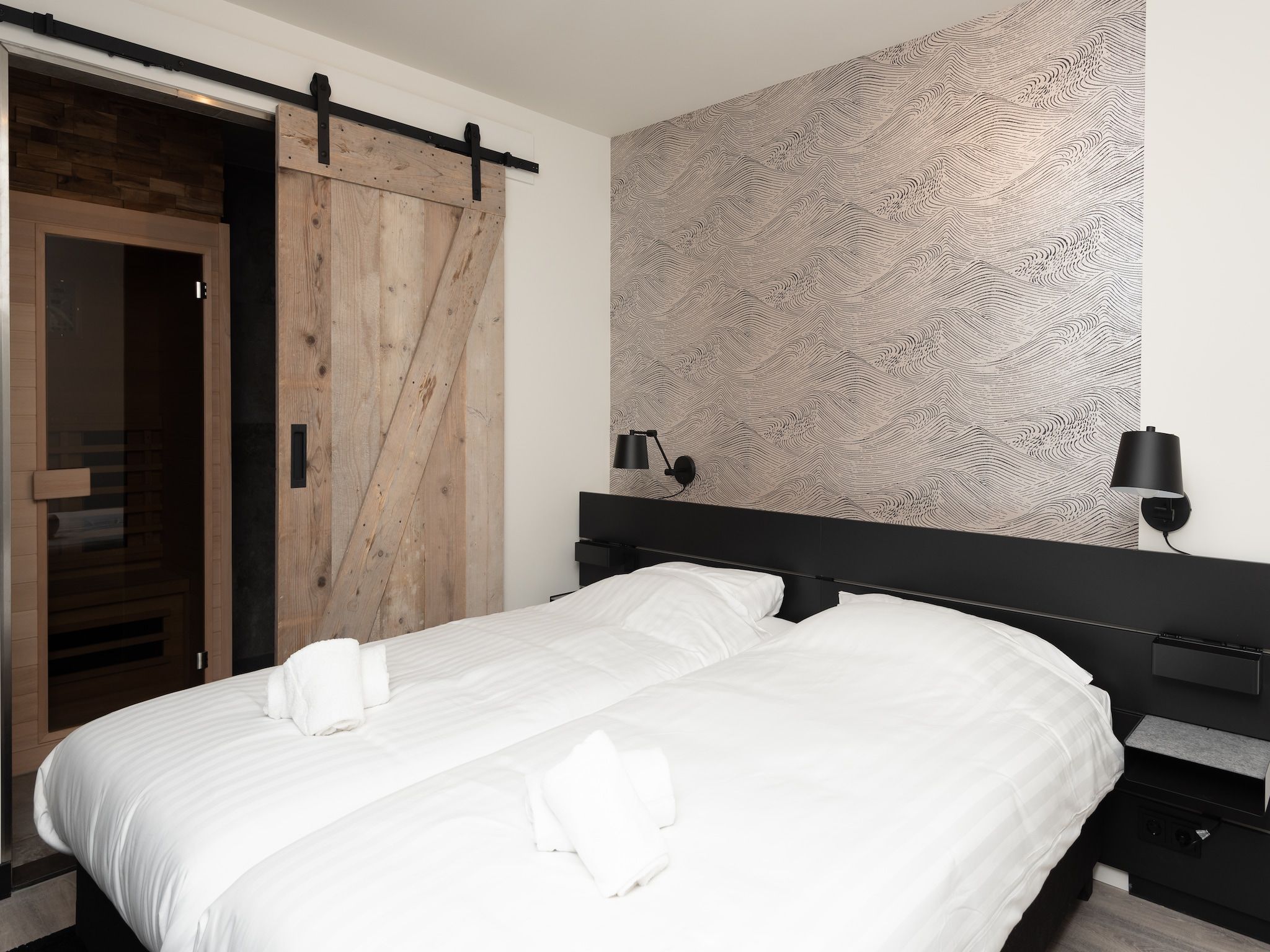 Een slaapkamer van Jan van Renesseweg 1 - 2 pax in Renesse