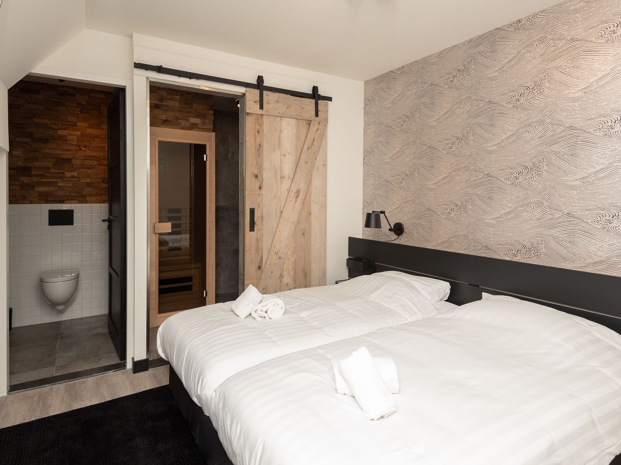 Een slaapkamer van Jan van Renesseweg 1 - 2 pax in Renesse
