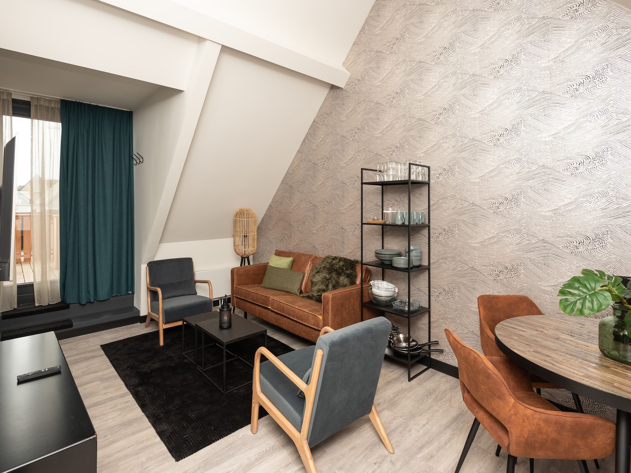 De woonkamer van Jan van Renesseweg 1 - Renesse 4p in Renesse