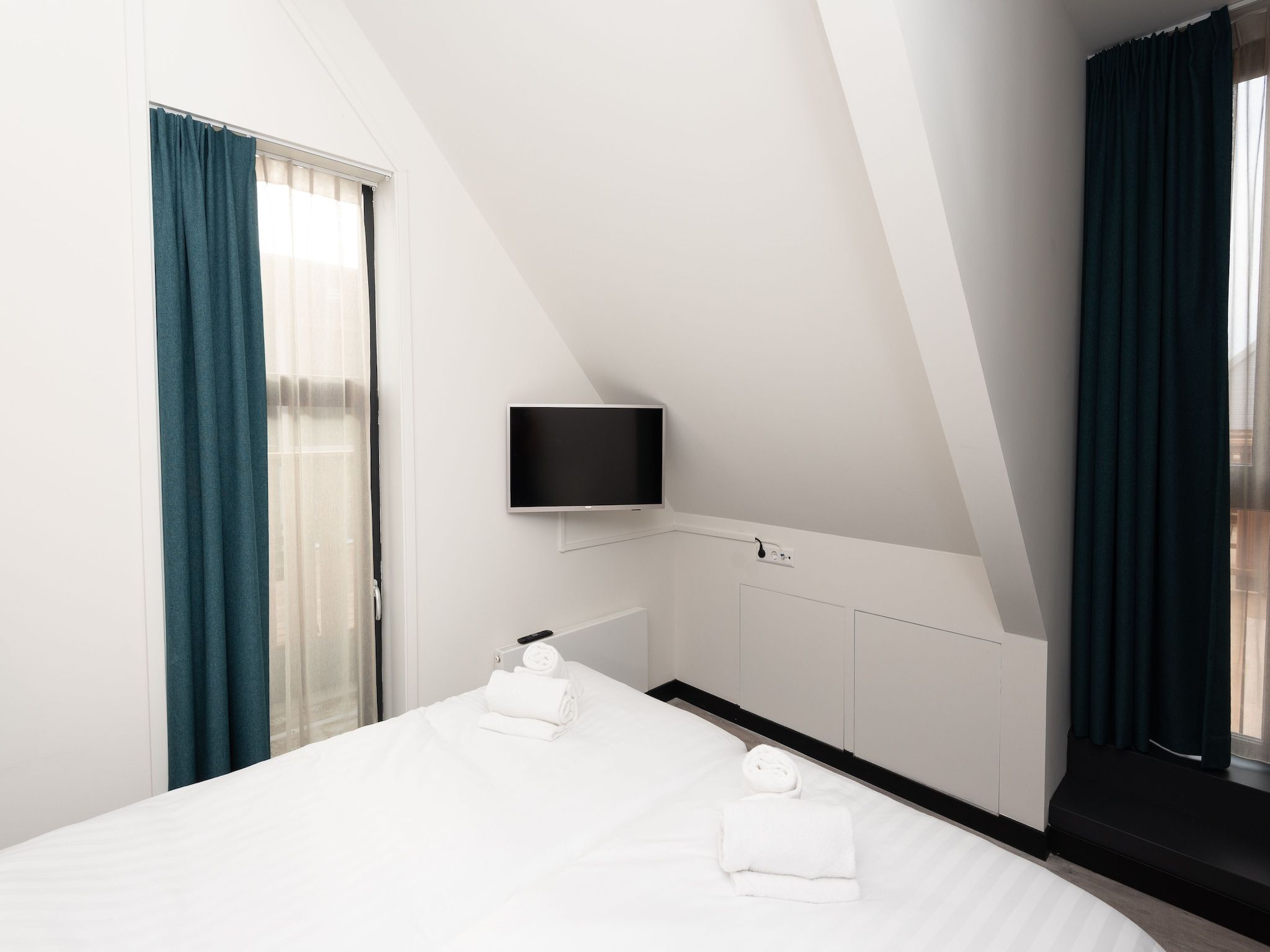 Een slaapkamer van Jan van Renesseweg 1 - Renesse 4p in Renesse