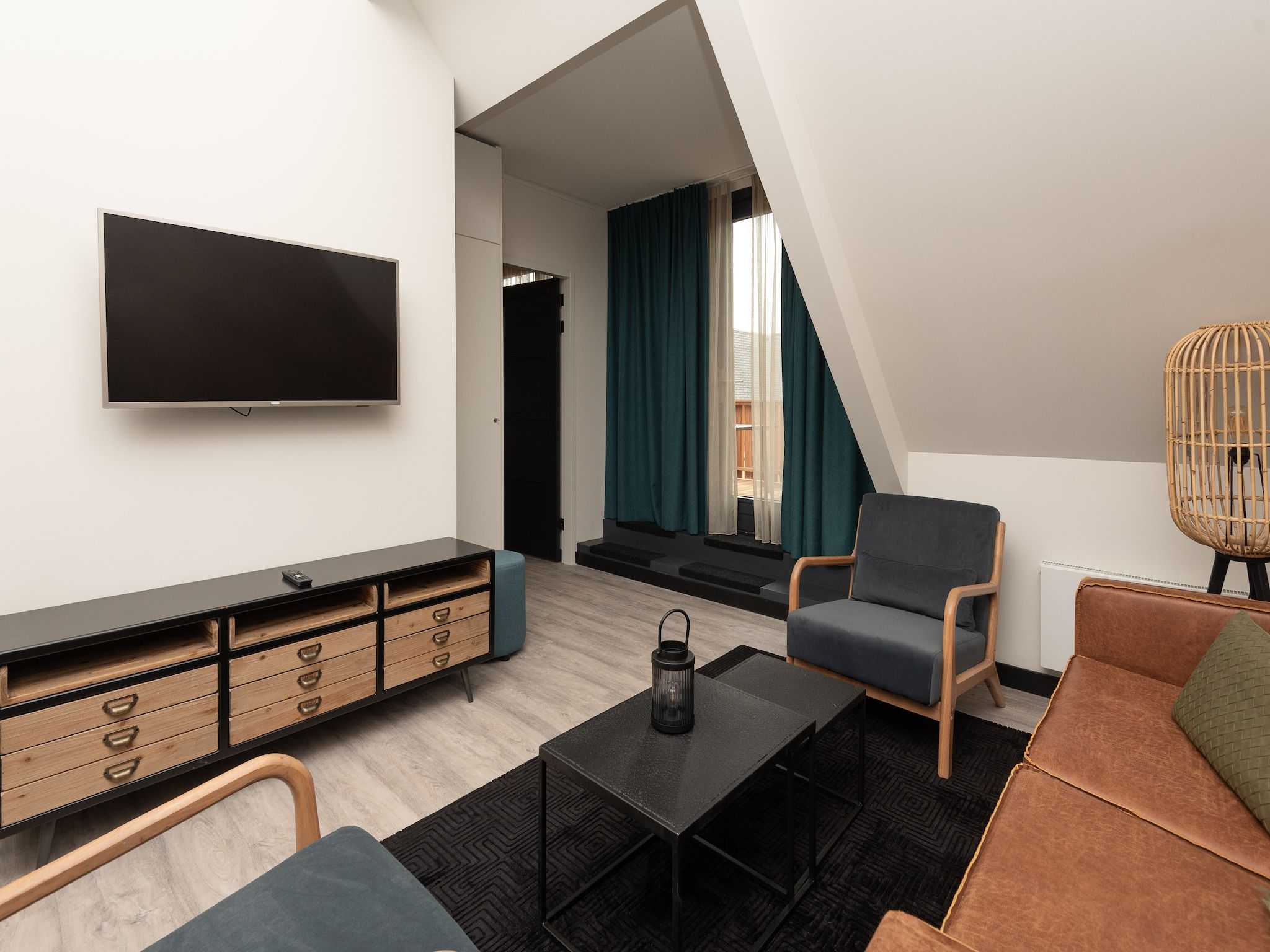 De woonkamer van Jan van Renesseweg 1 - Renesse 4p in Renesse