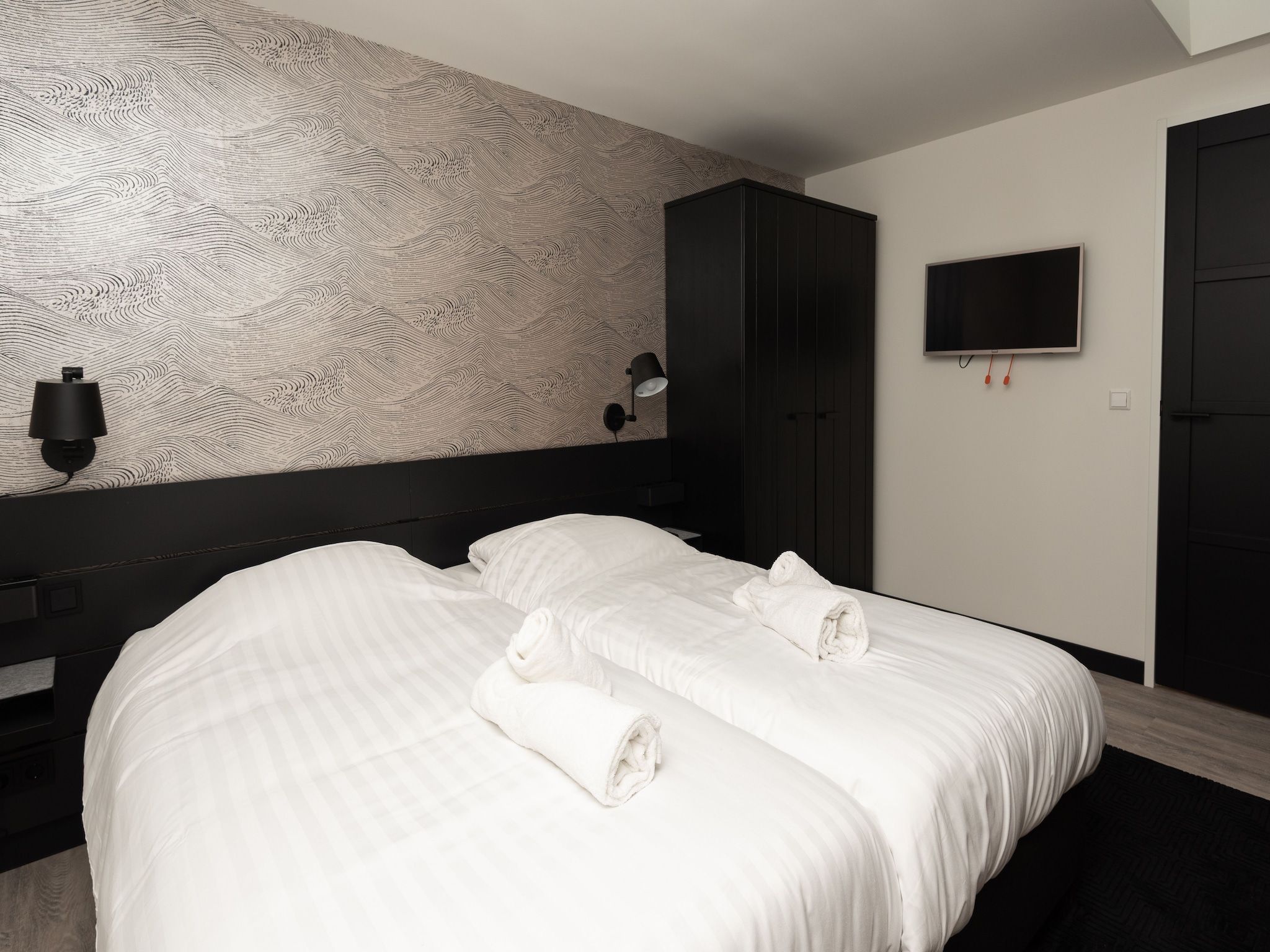 Een slaapkamer van Jan van Renesseweg 1 - 2 pers in Renesse