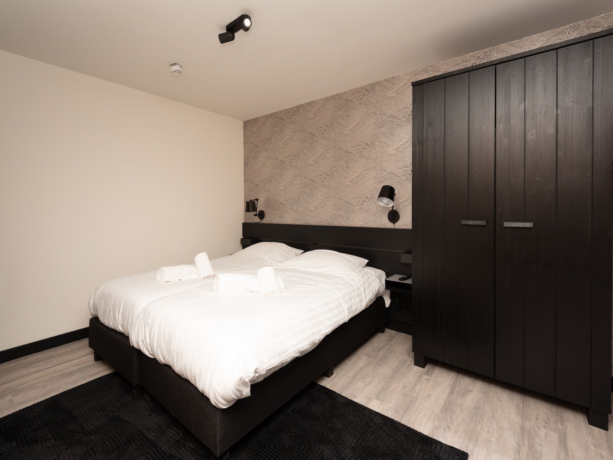 Een slaapkamer van Jan van Renesseweg 1 - 2 pers in Renesse
