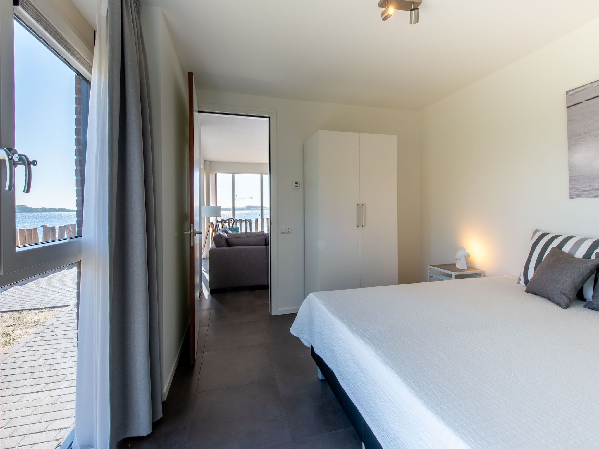 Een slaapkamer van Appartement 4c  Schotsman Watersport in Kamperland