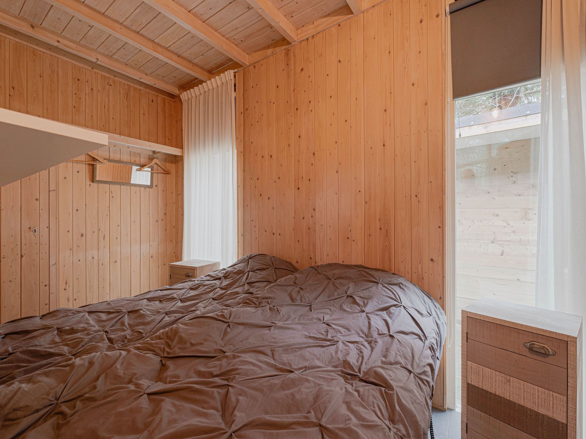 Een slaapkamer van Boshuis De Klim in Norg