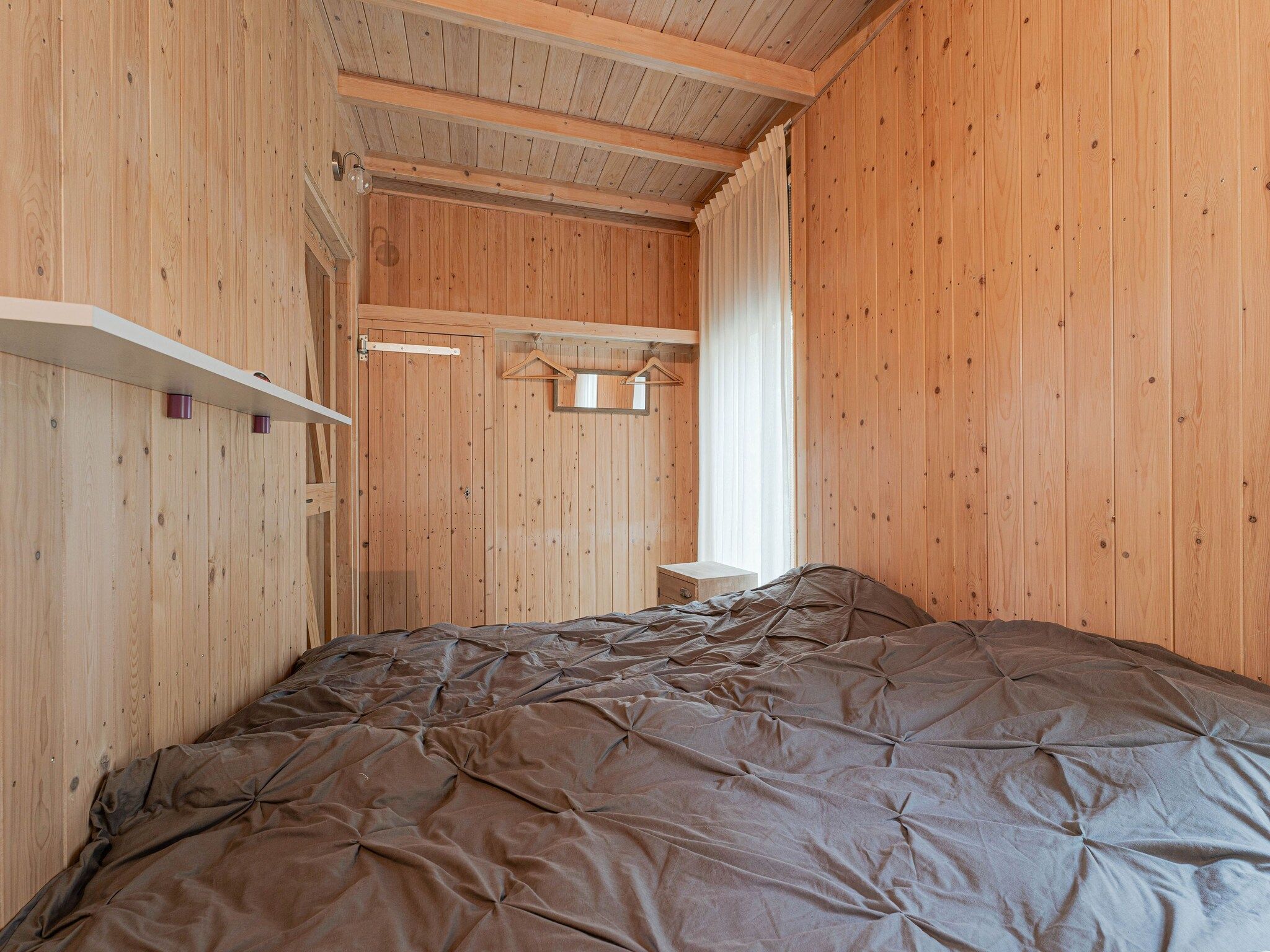 Een slaapkamer van Boshuis De Klim in Norg