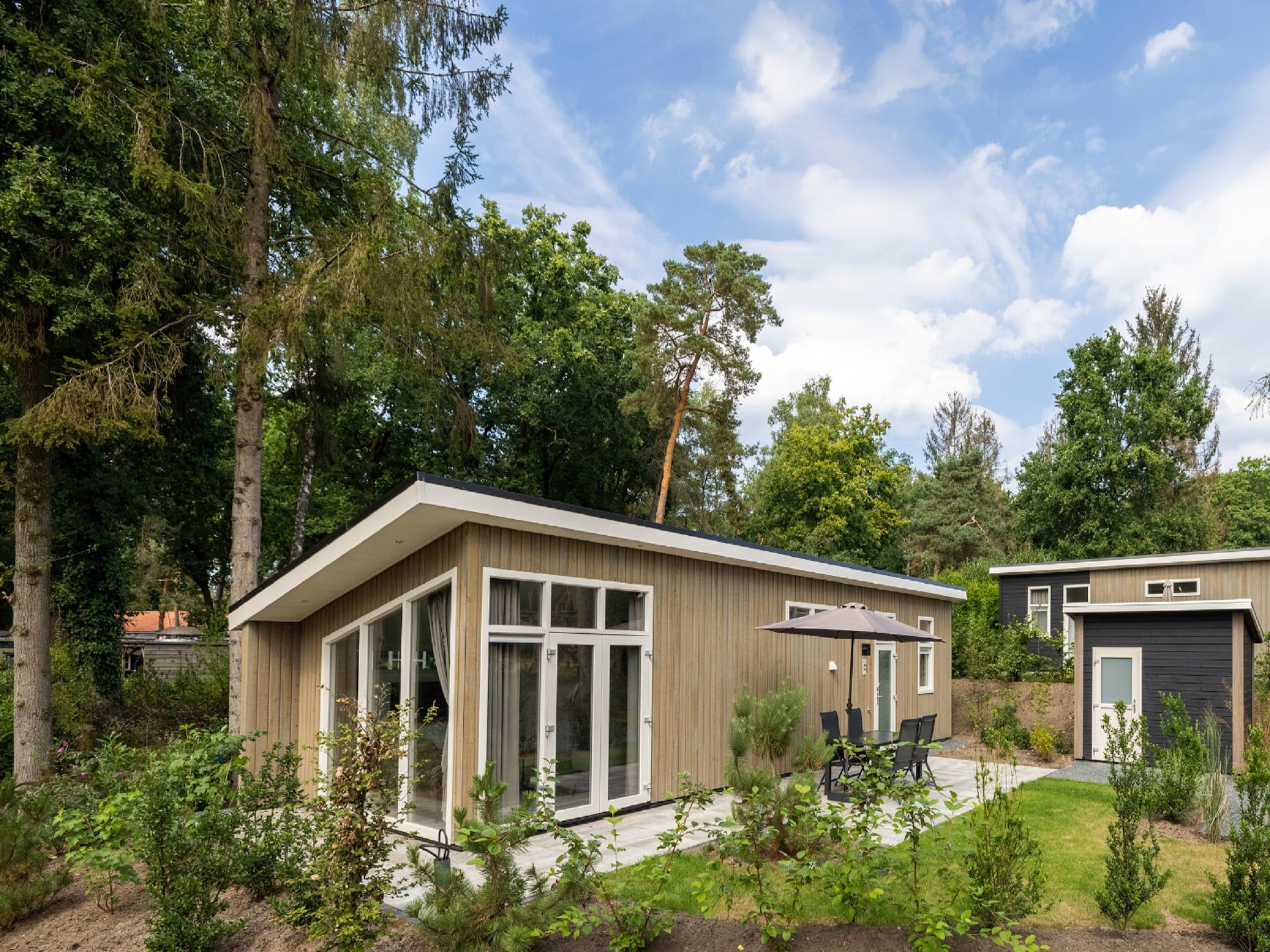 De buitenkant van Vakantiepark De Rimboe & De Woeste Hoogte 27 in Hoenderloo