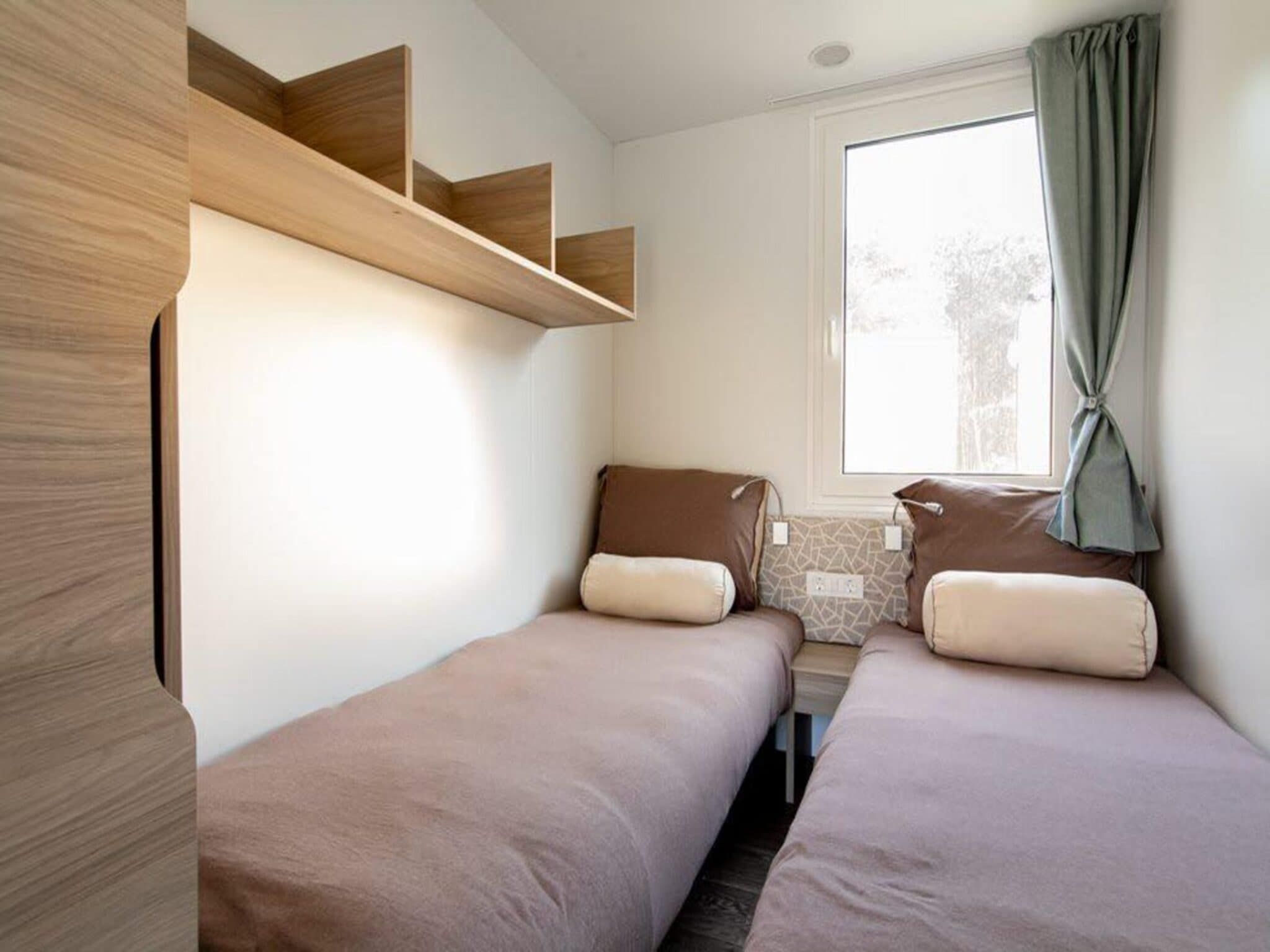 Een slaapkamer van Cosy Unique Plus 6 in Olburgen