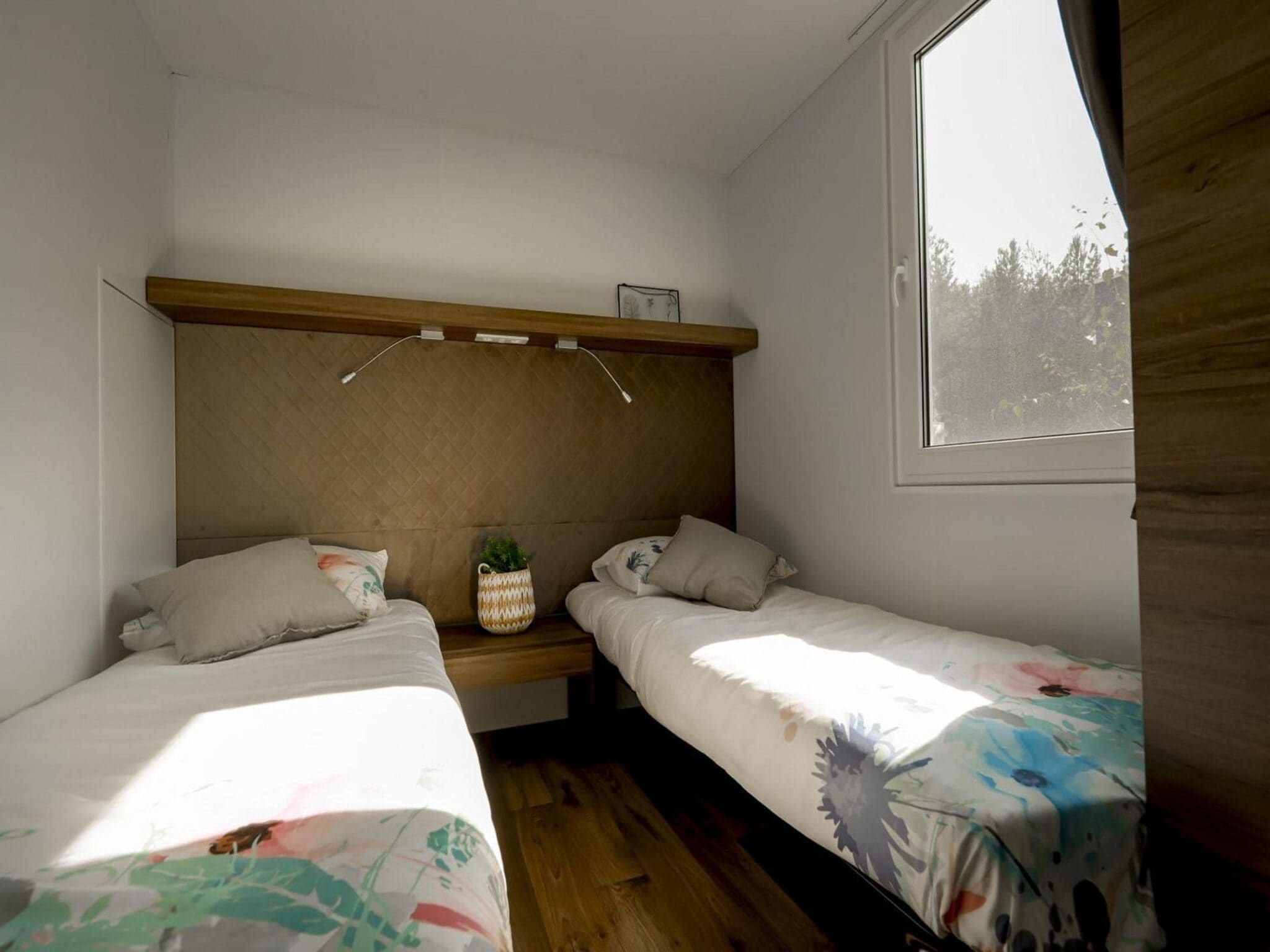 Een slaapkamer van Cosy Unique Plus 6 in Olburgen