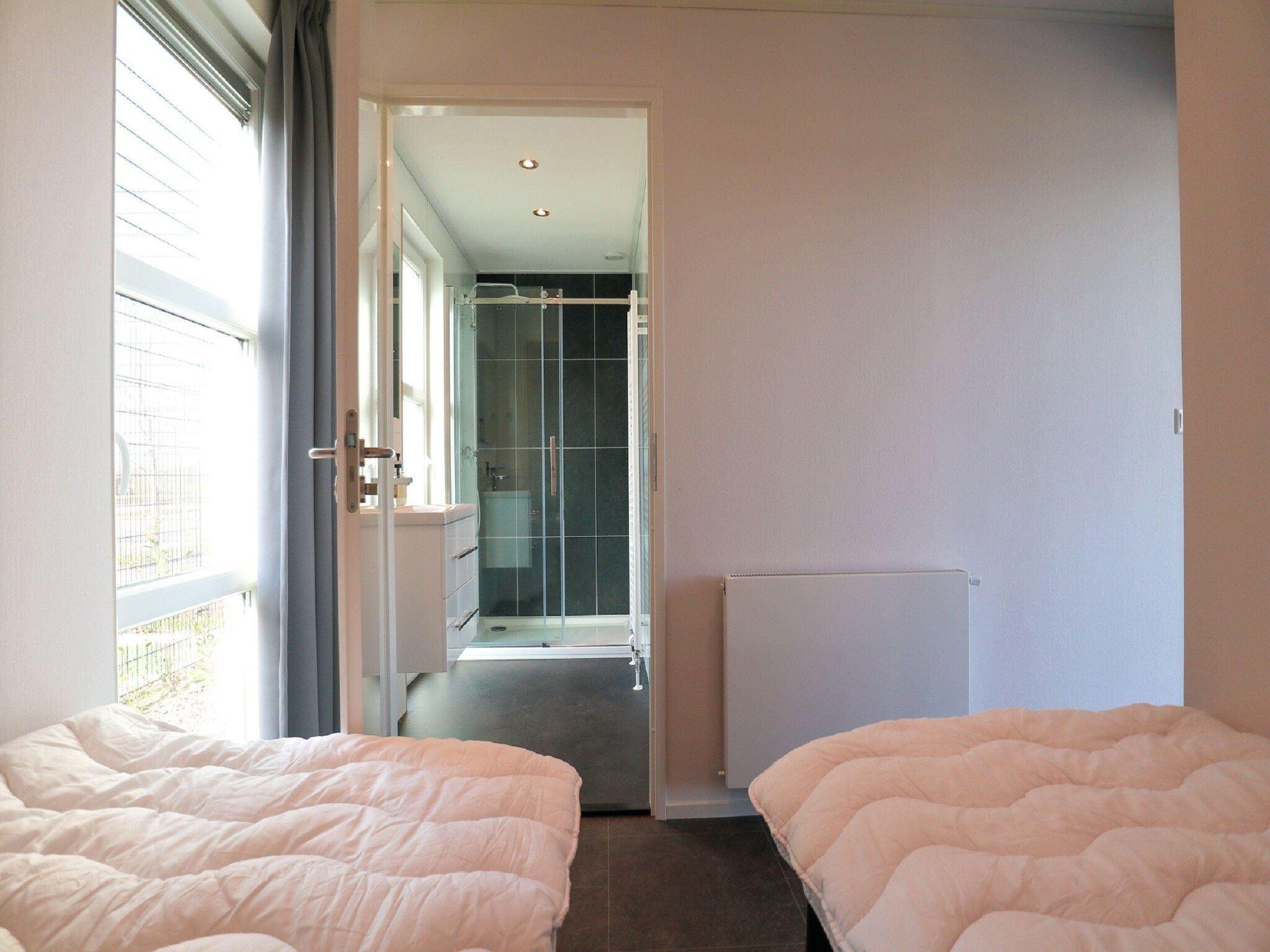 Een slaapkamer van Cube Exclusif 4 in Olburgen