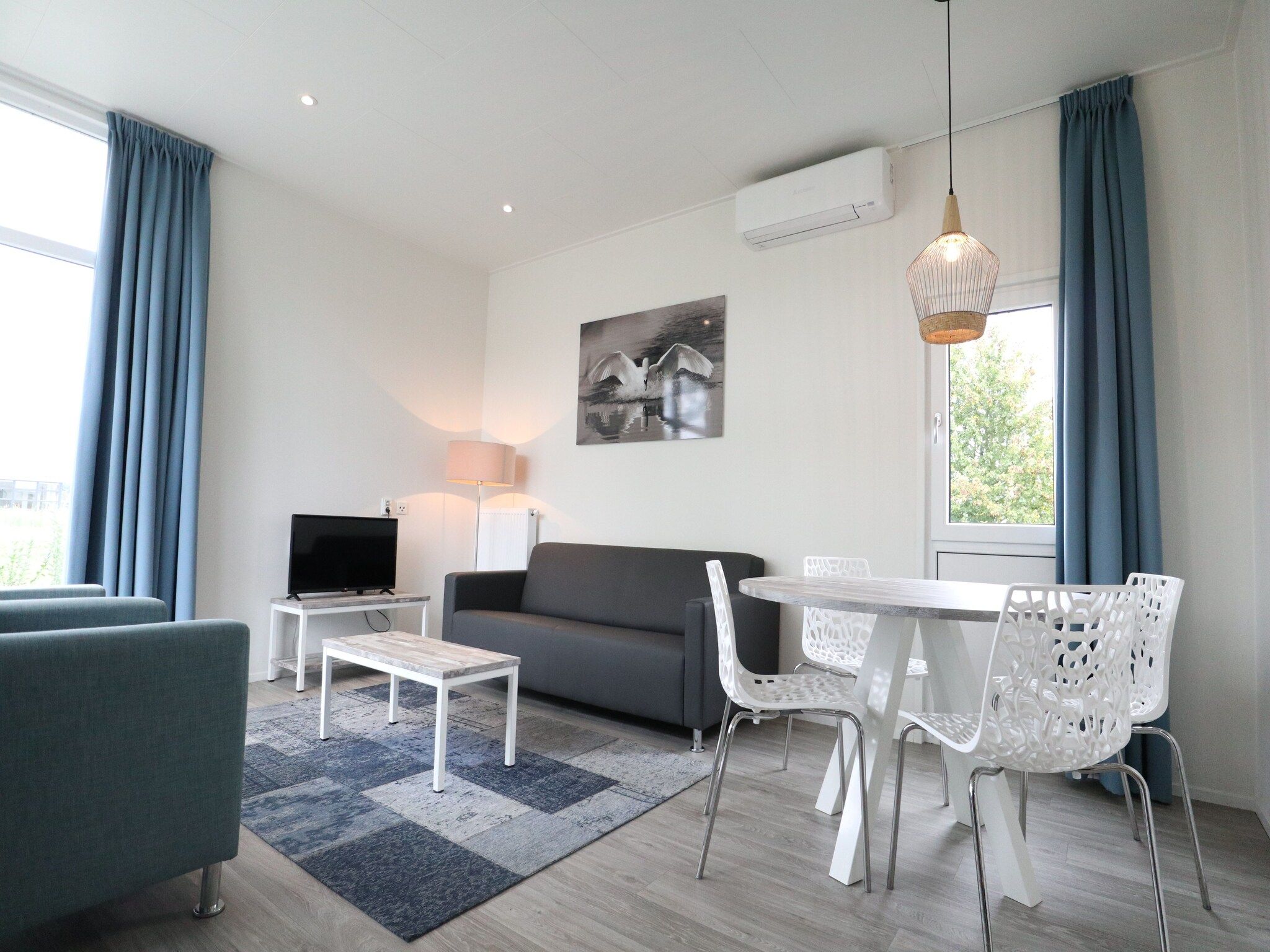 De woonkamer van Cube la Mer 4 in Olburgen