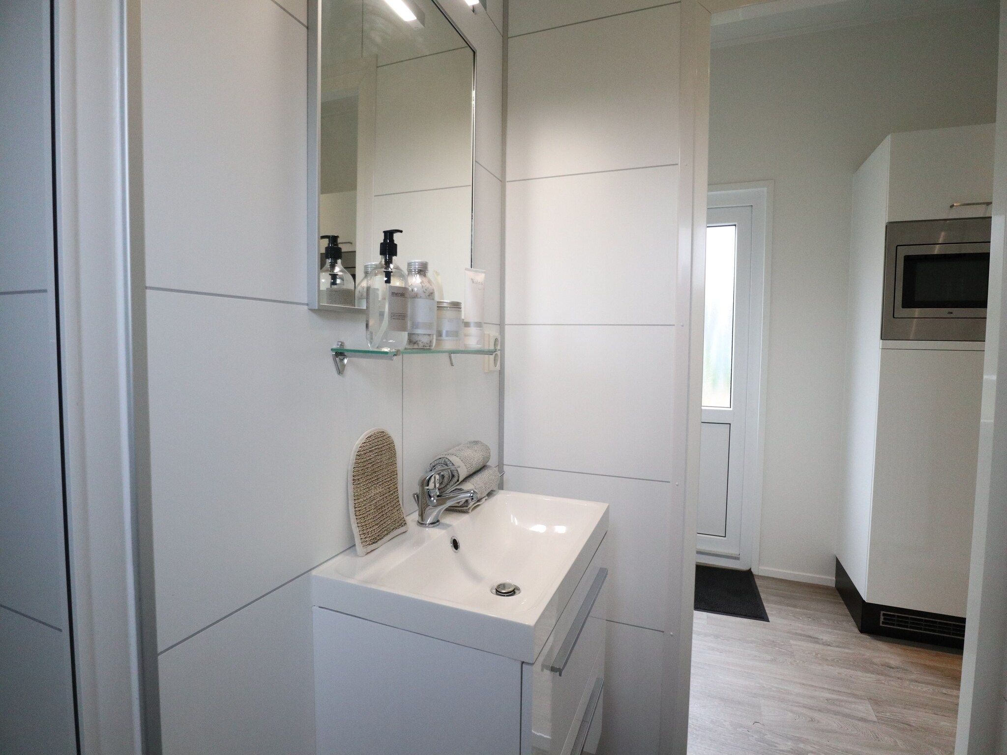 De badkamer van Cube la Mer 4 in Olburgen