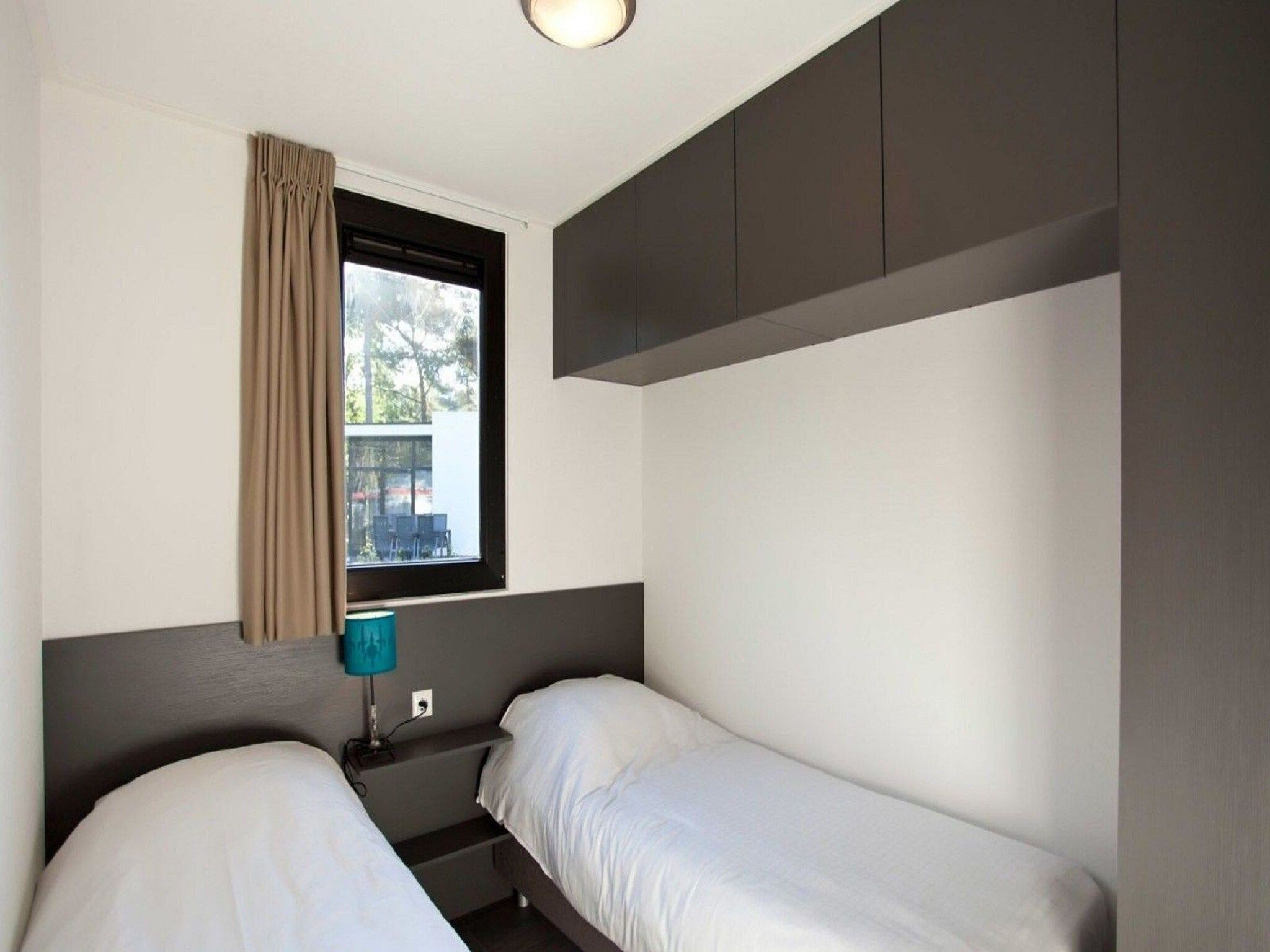 Een slaapkamer van L-Cube Plus 6 in Olburgen