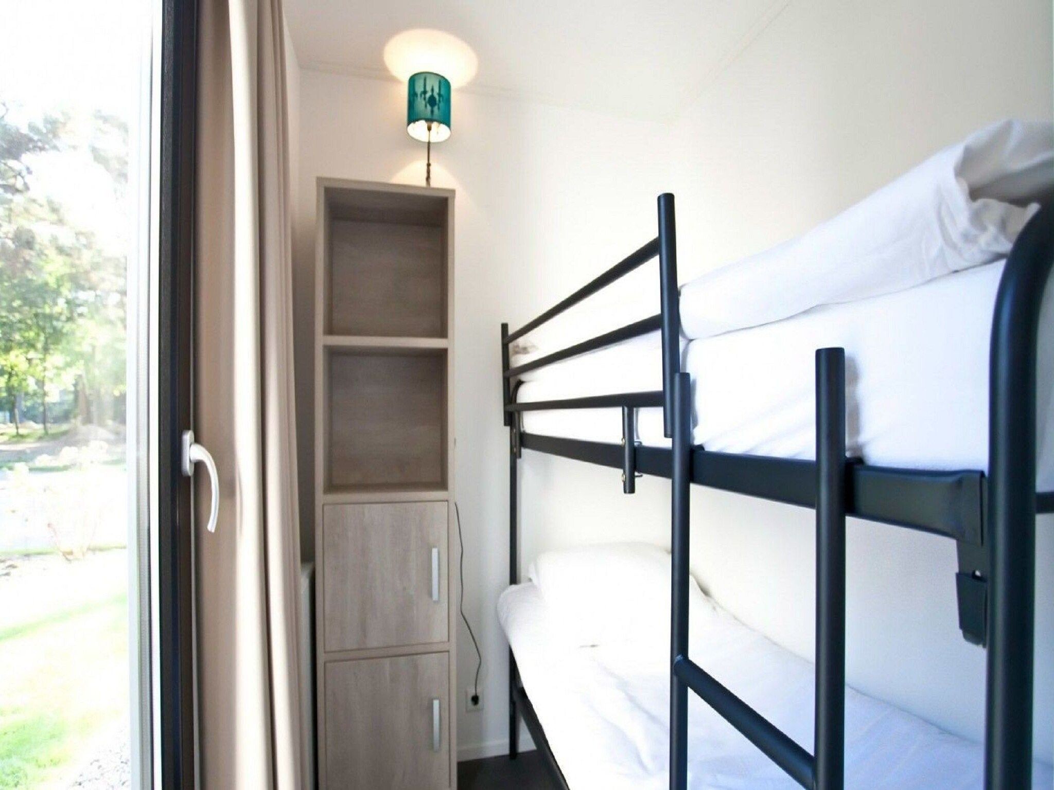 Een slaapkamer van L-Cube Plus 6 in Olburgen