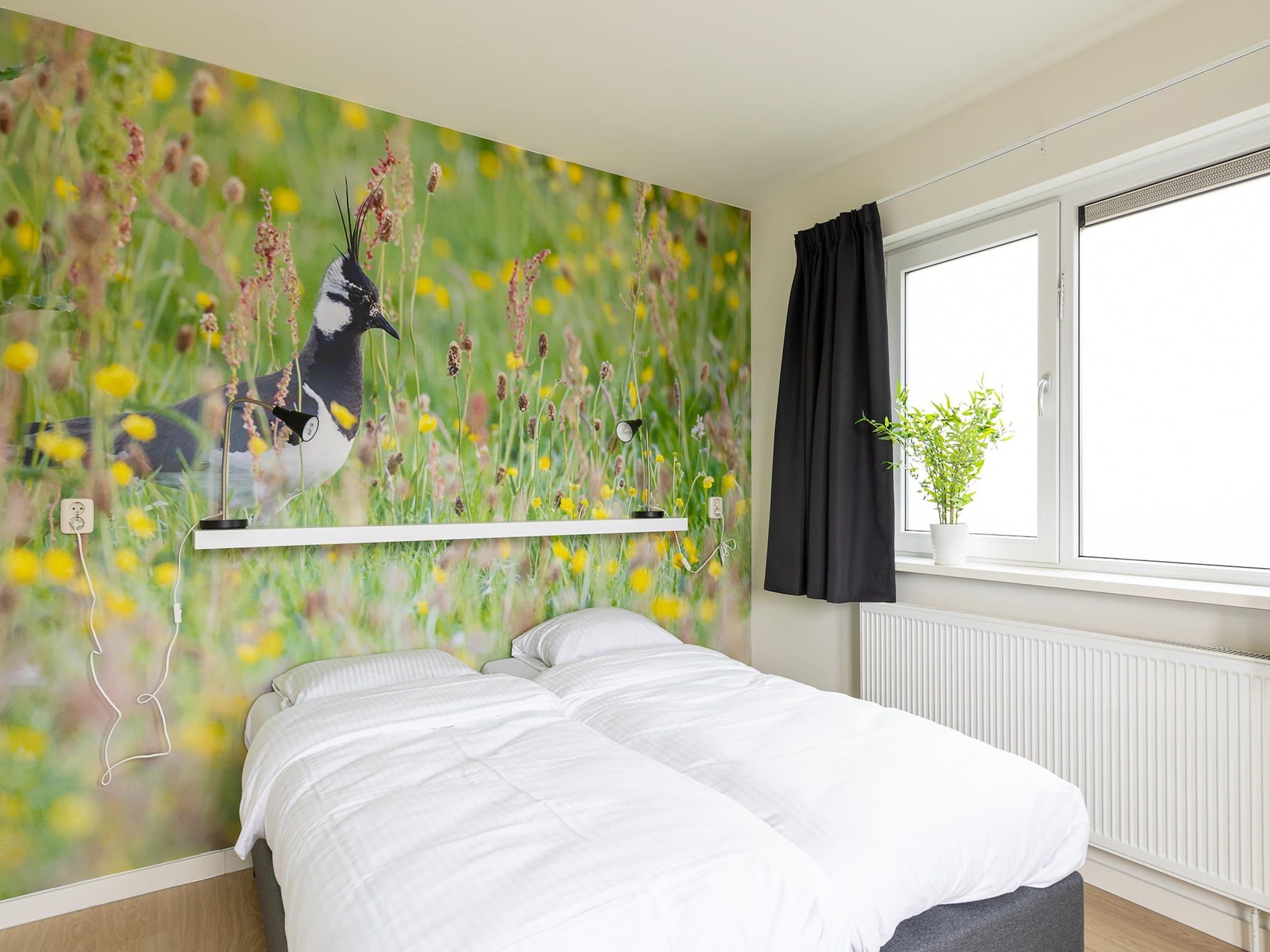 Een slaapkamer van Bramerduin in Nes