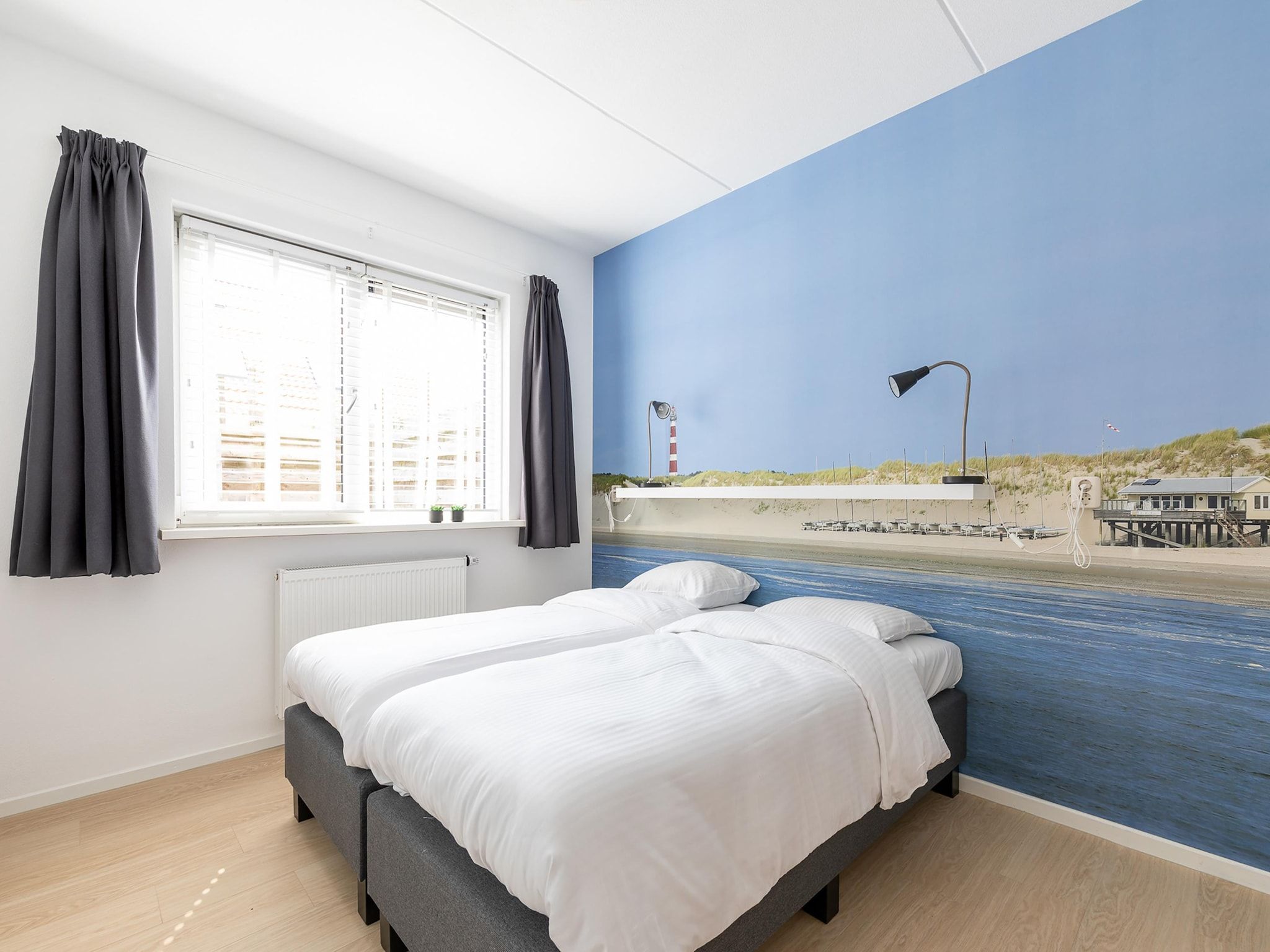 Een slaapkamer van Bramerduin in Nes