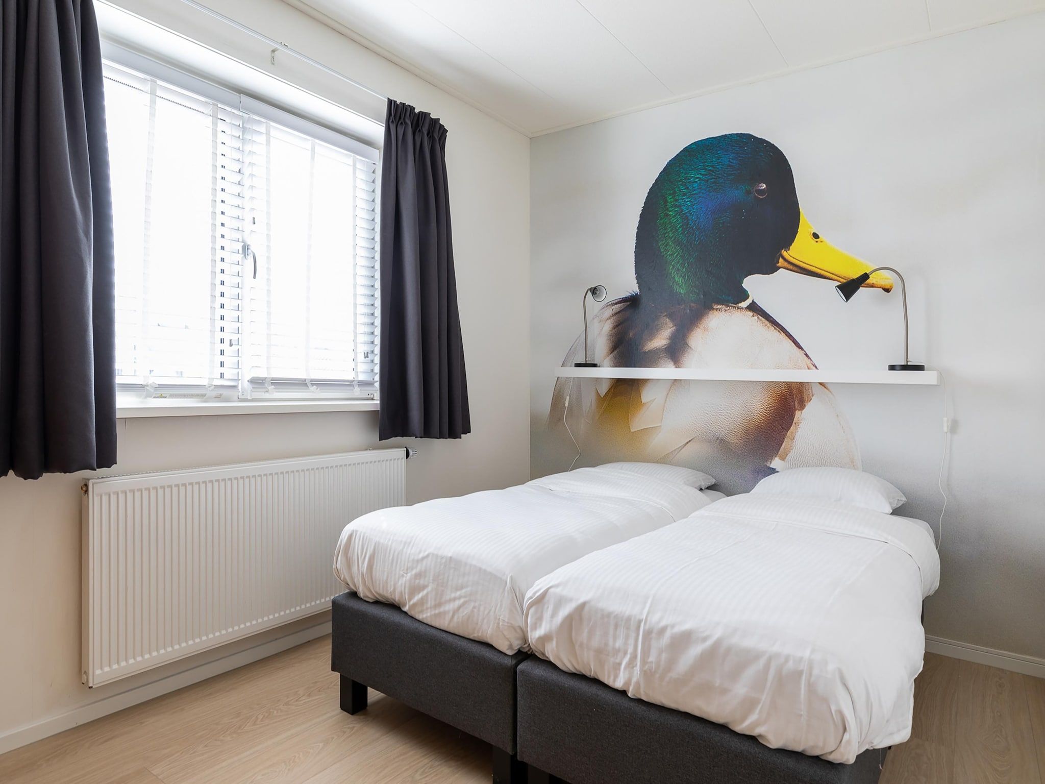 Een slaapkamer van Bramerduin in Nes