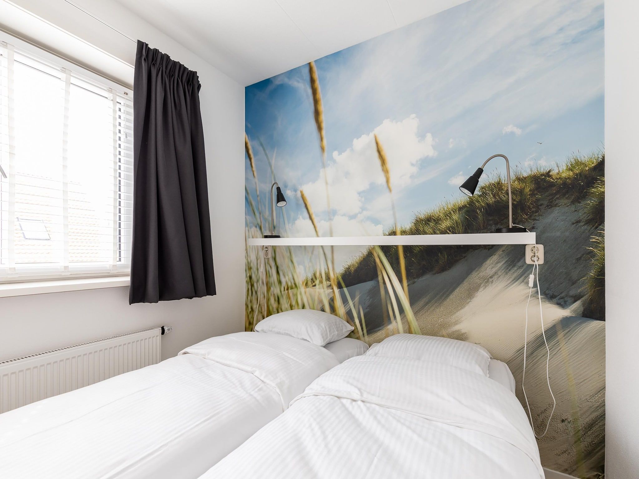 Een slaapkamer van Bramerduin in Nes