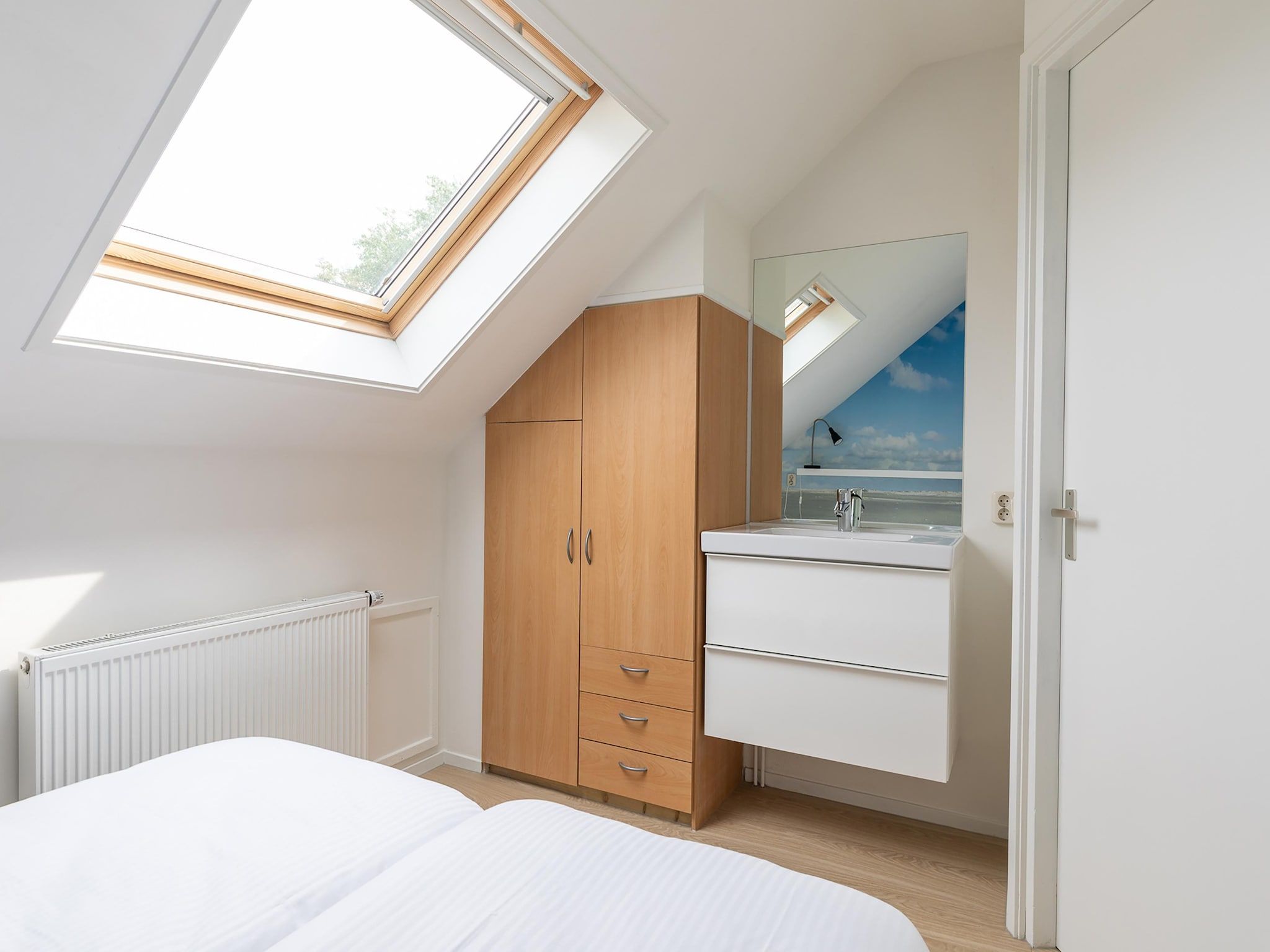 Een slaapkamer van Bramerduin in Nes