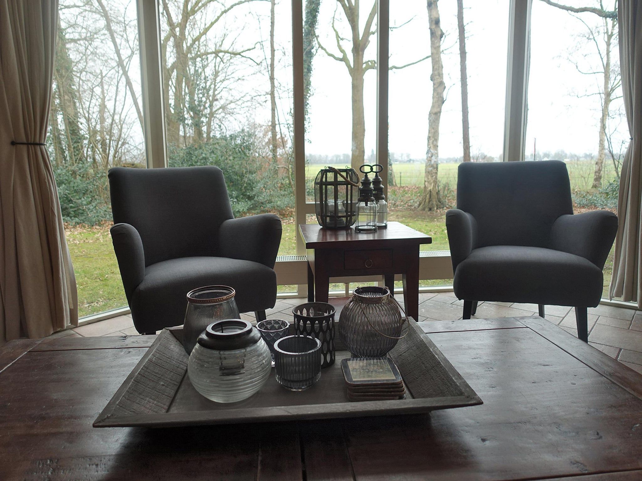 De woonkamer van Buitenplaats Berg en Bos nummer 4 in Lemele