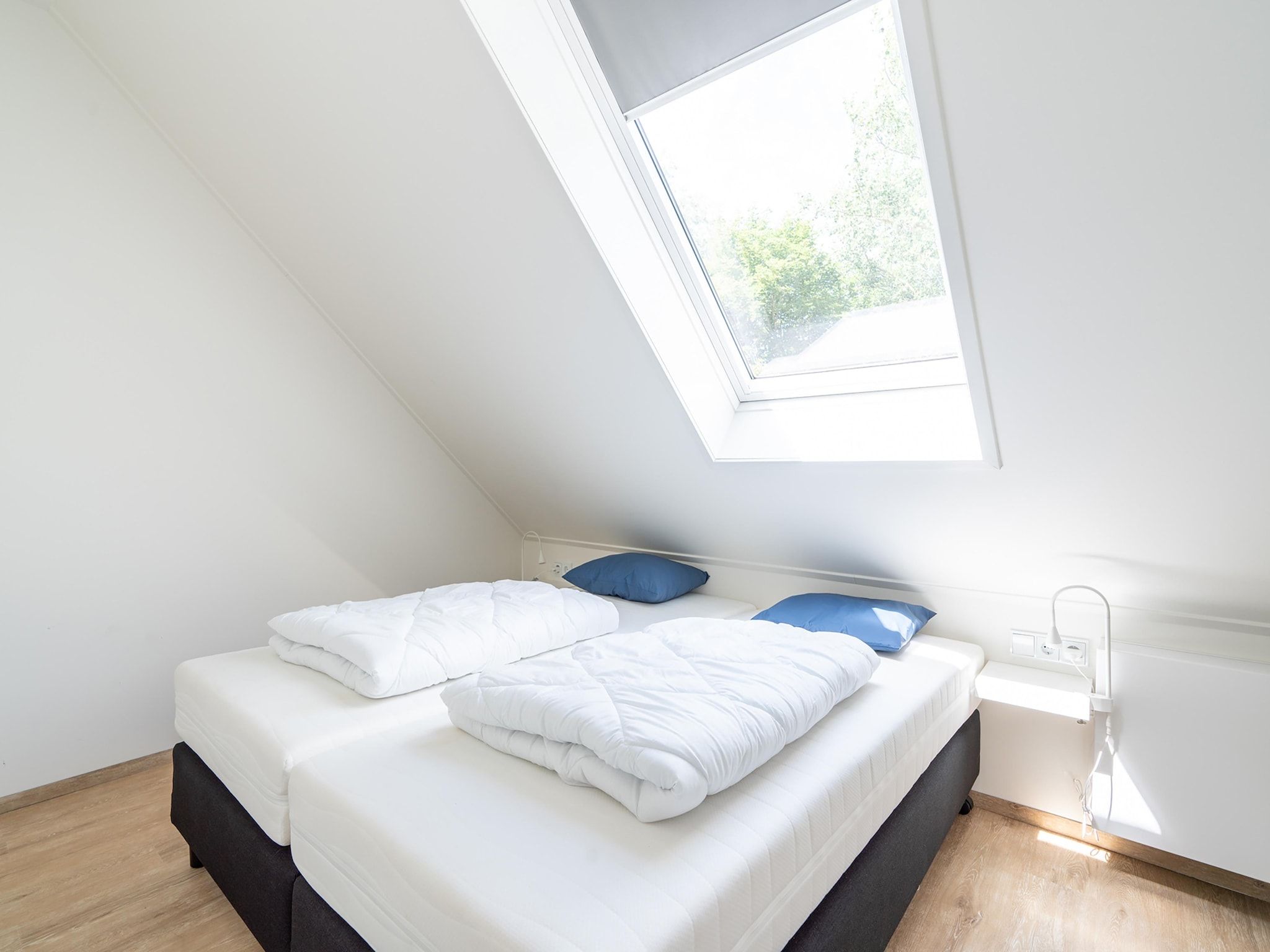 Een slaapkamer van Kaapsduin in Nes