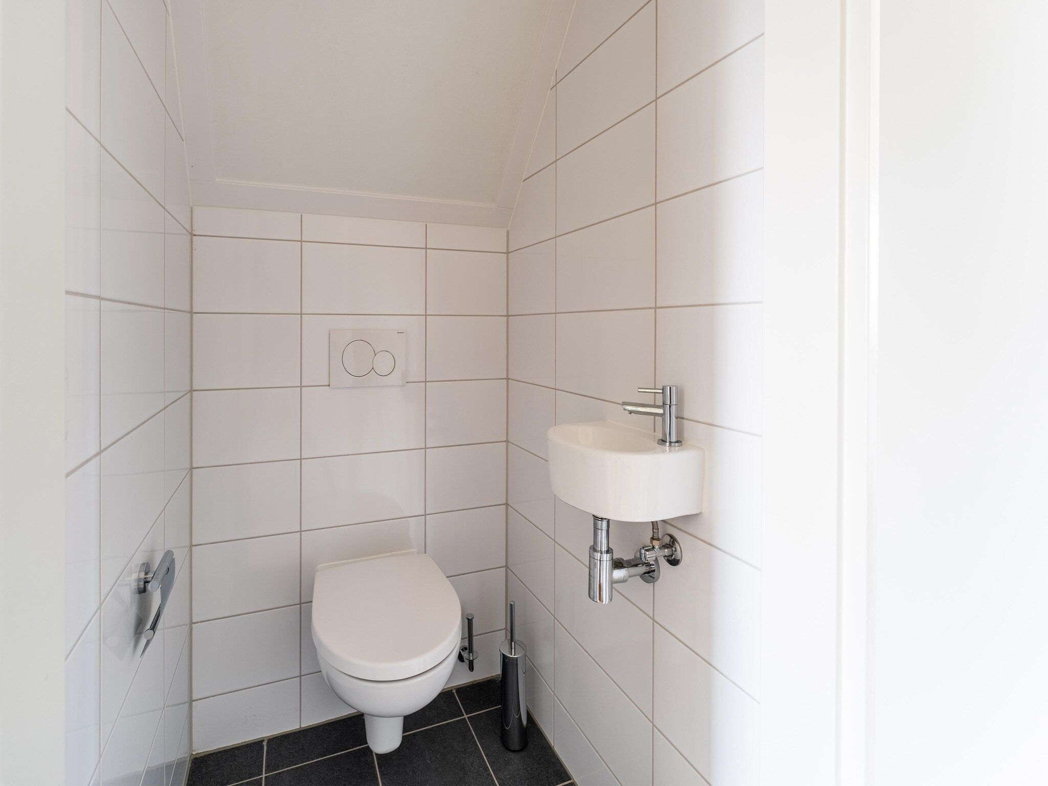 De badkamer van De Tjiftjaf Huis Nr 21 in Scherpenisse