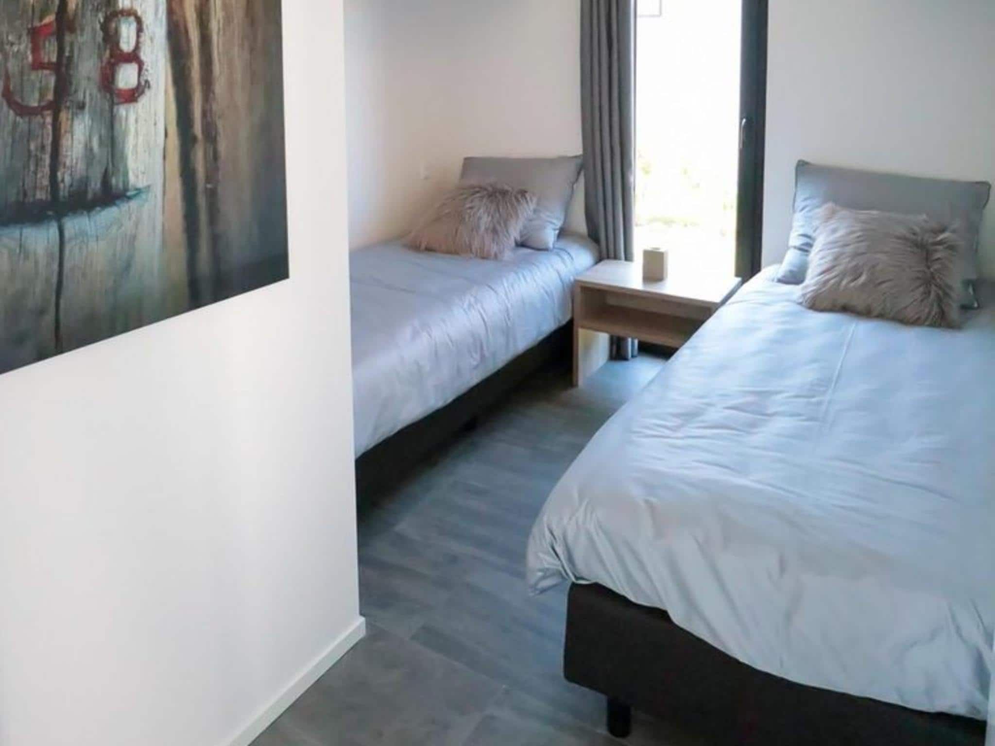Een slaapkamer van Cube Exclusif Plus 6 in Nieuwvliet