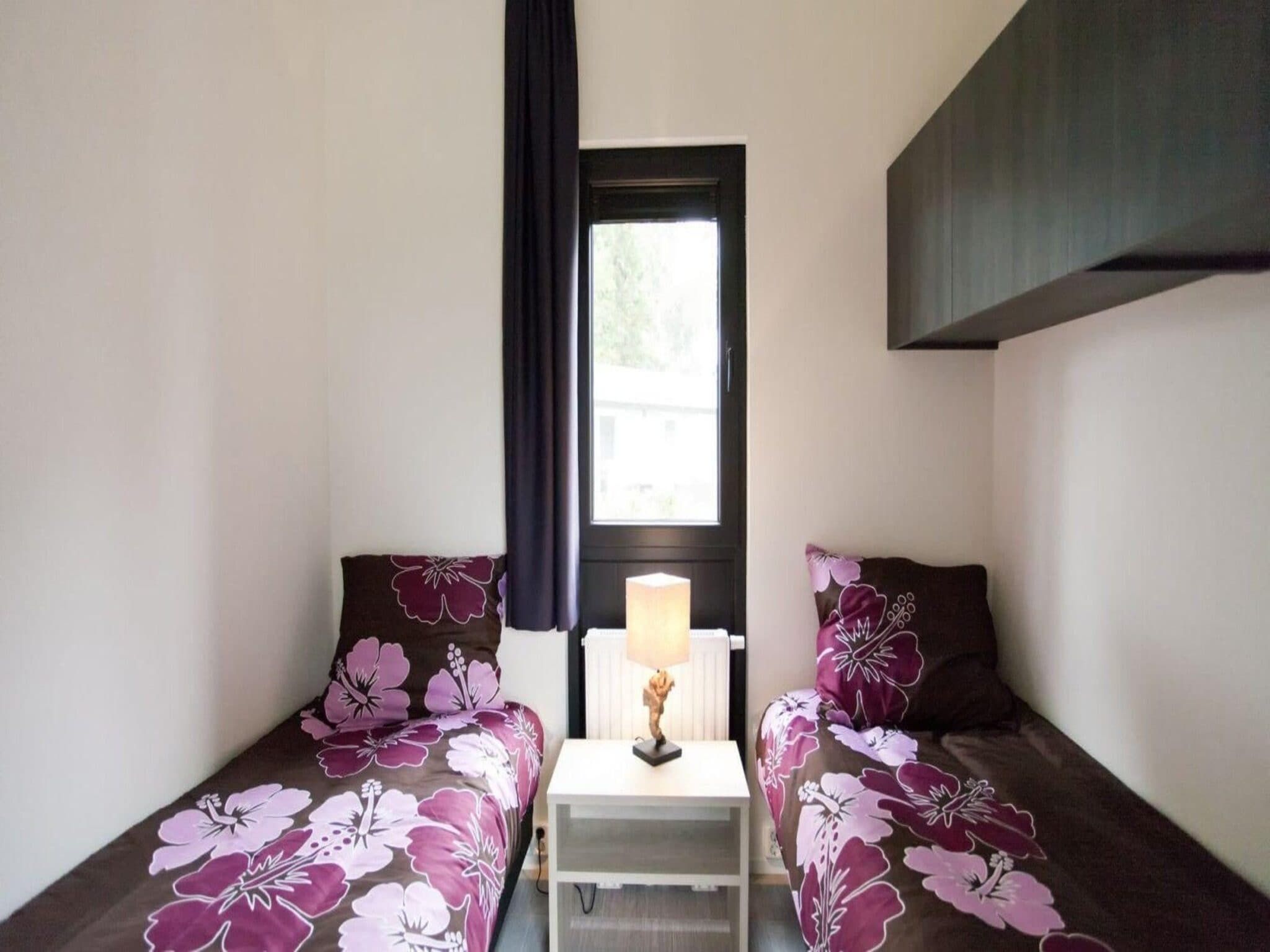 Een slaapkamer van Cube La Mer 4 in Nieuwvliet