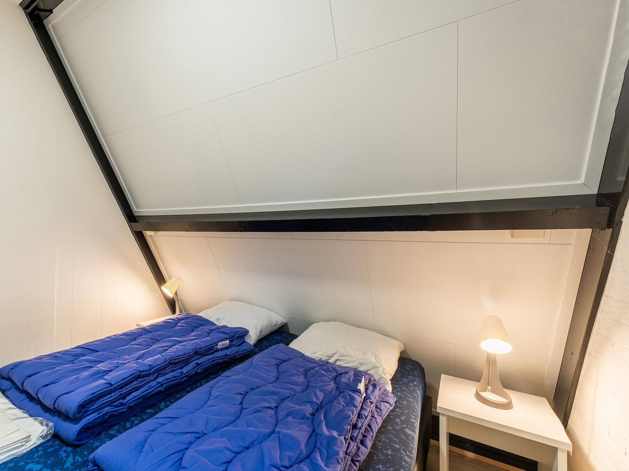 Een slaapkamer van Vosseven 54 Albatros in Stramproy