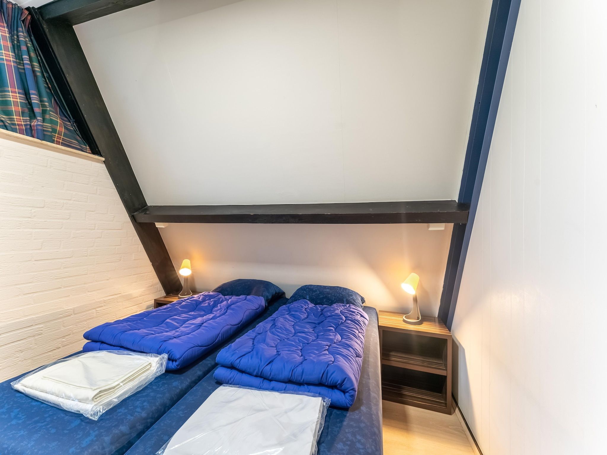 Een slaapkamer van Vosseven 55 Annemoon in Stramproy
