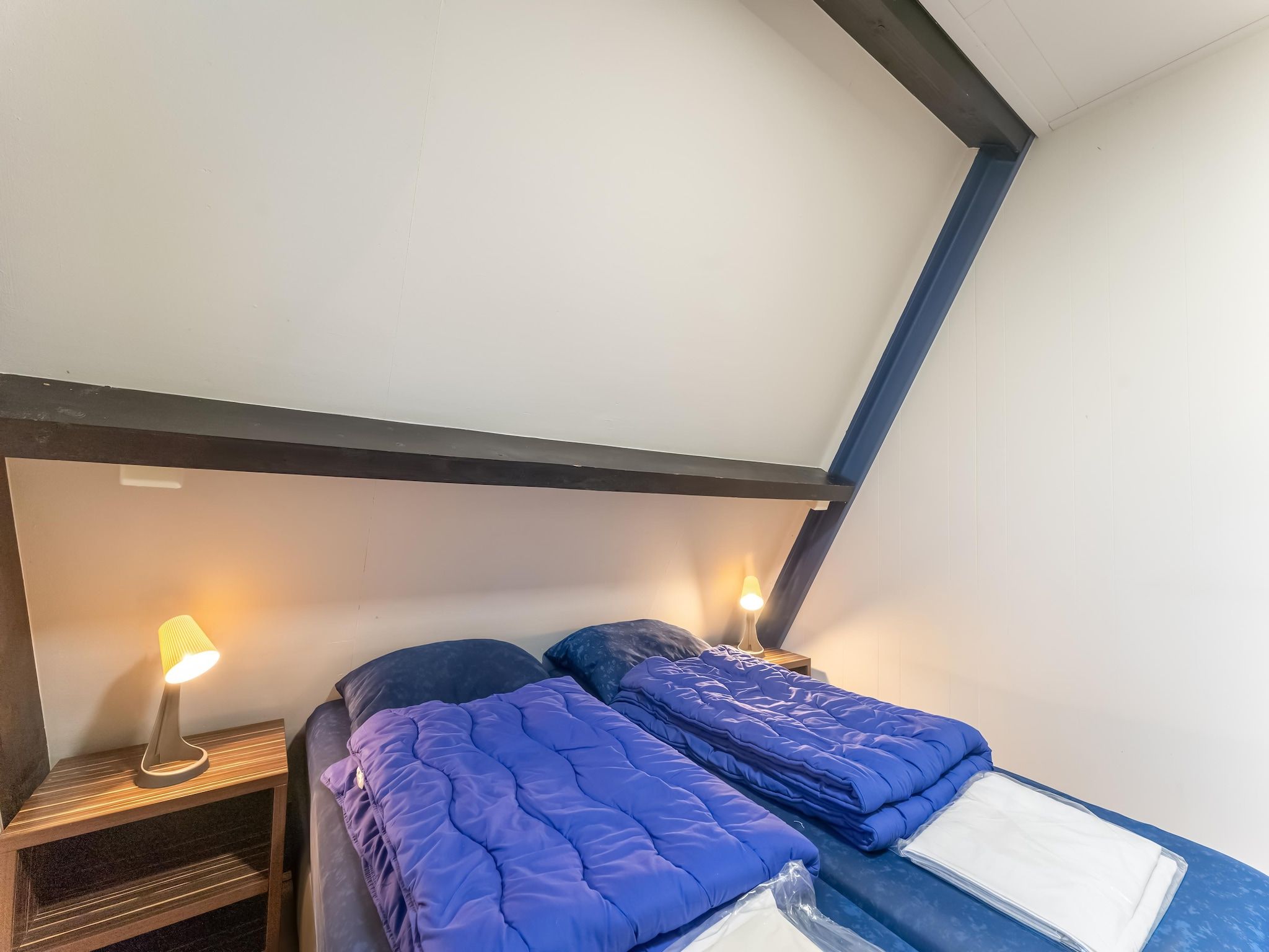 Een slaapkamer van Vosseven 55 Annemoon in Stramproy