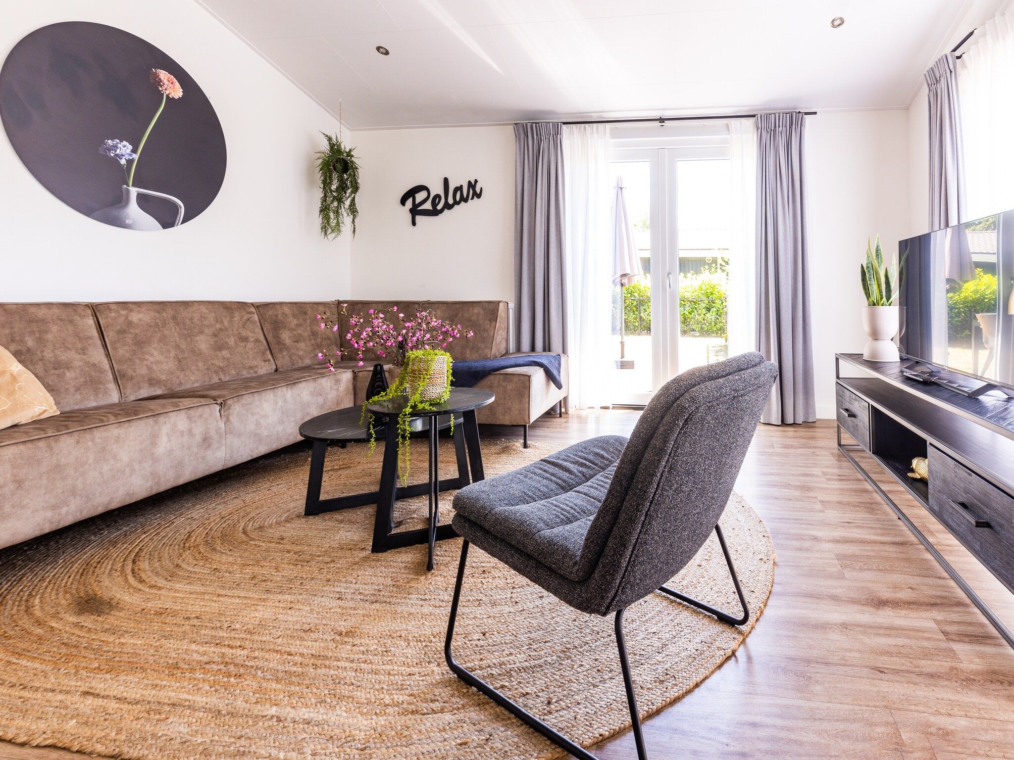 De woonkamer van Vakantiepark Molenvelden 6 in Veldhoven