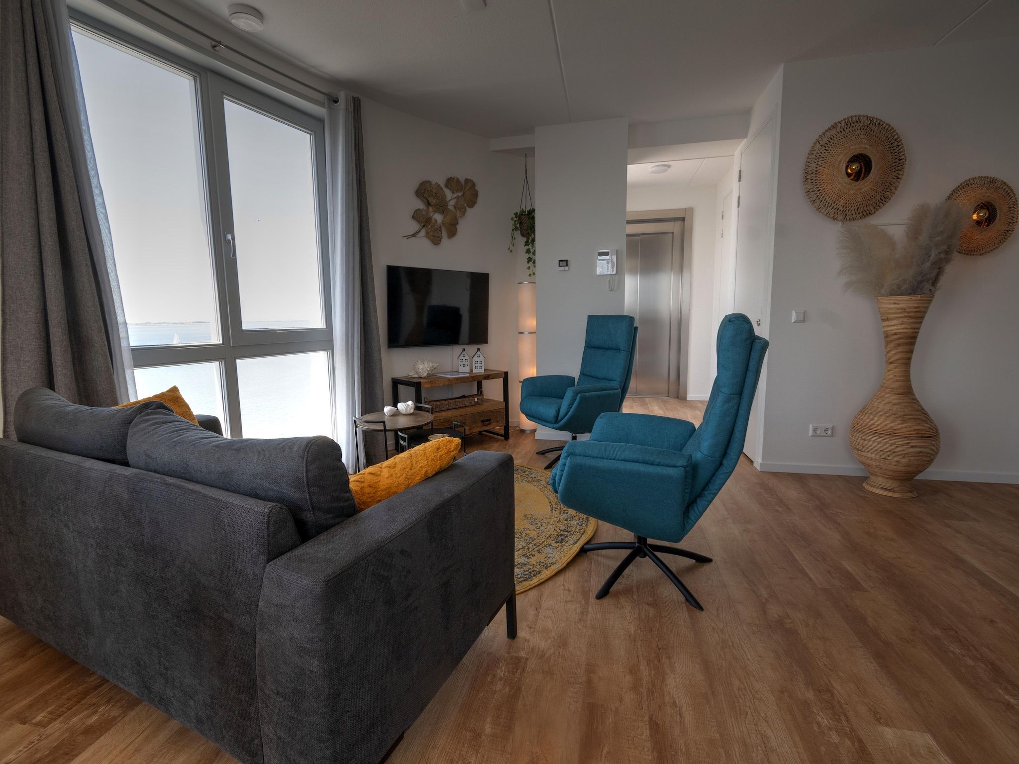 De woonkamer van Casa Isla Bella in Scherpenisse