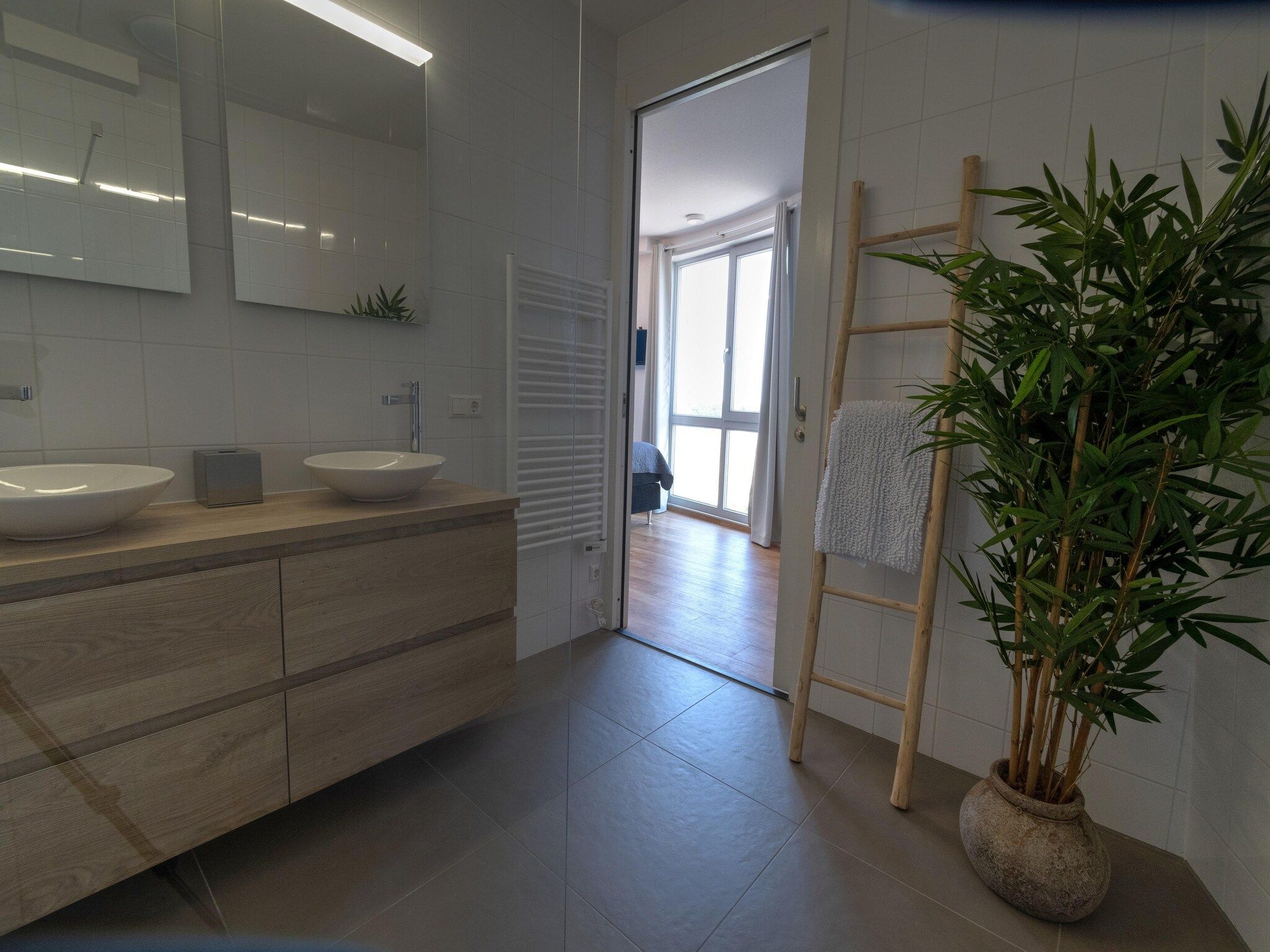 De badkamer van Casa Isla Bella in Scherpenisse
