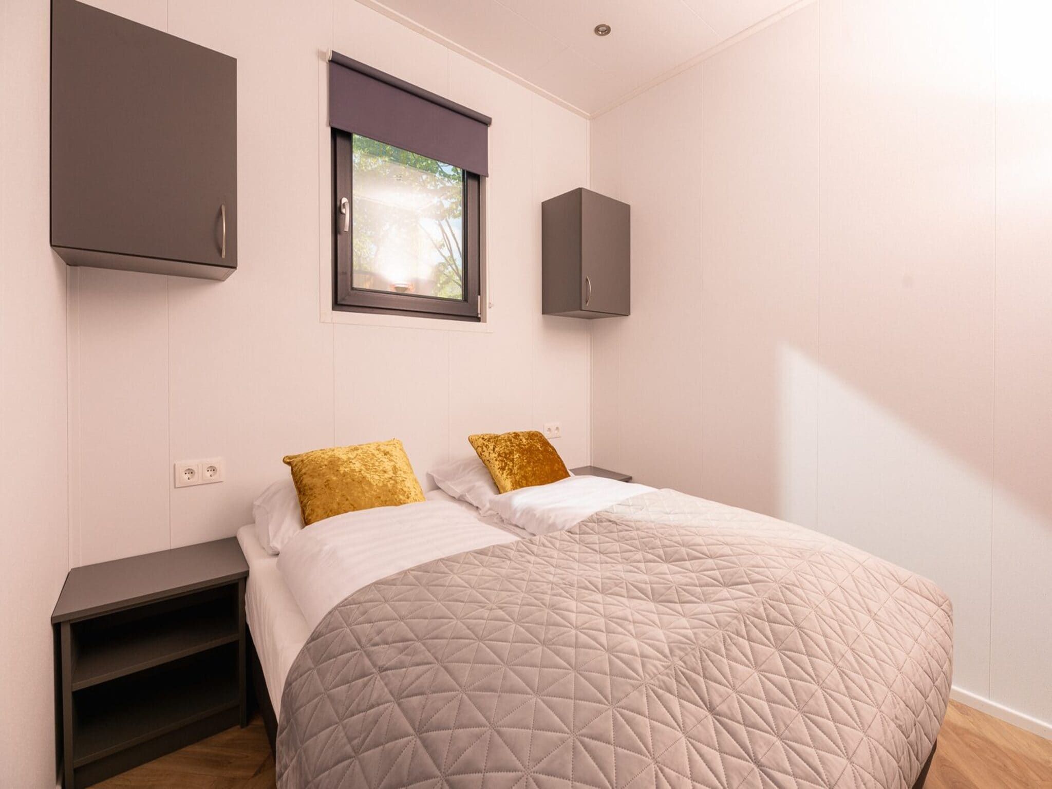 Een slaapkamer van Vakantiepark Mölke 35 in Zuna