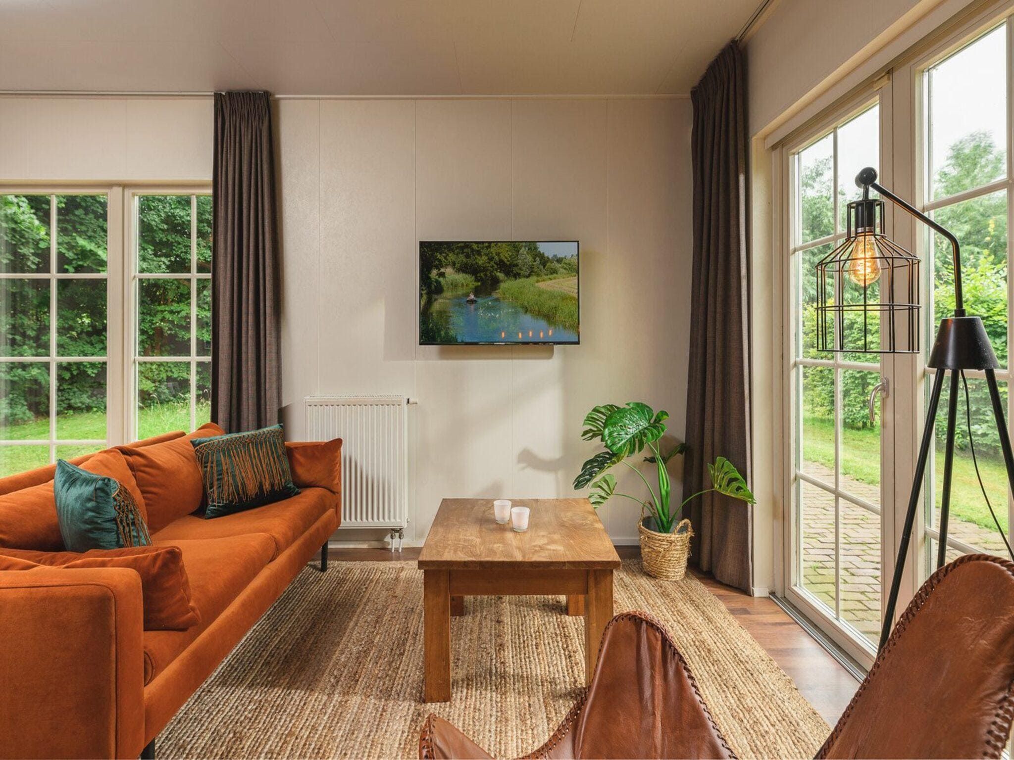 De woonkamer van Vakantiepark Mölke 29 in Zuna