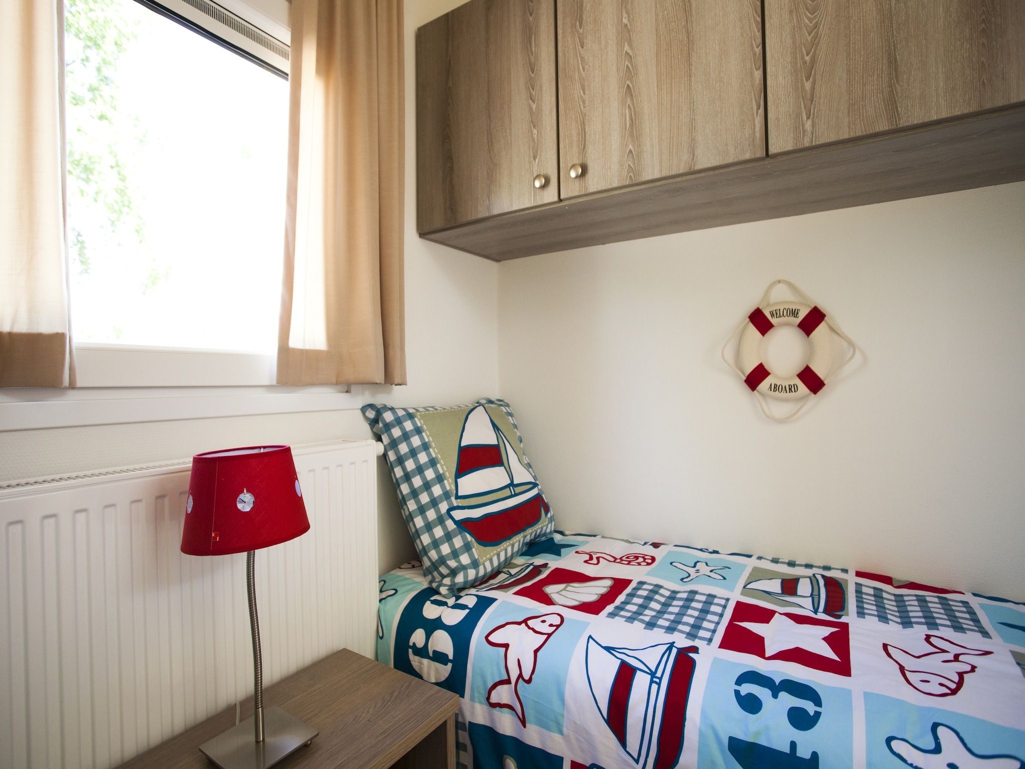 Een slaapkamer van Cabana 4 in Breskens