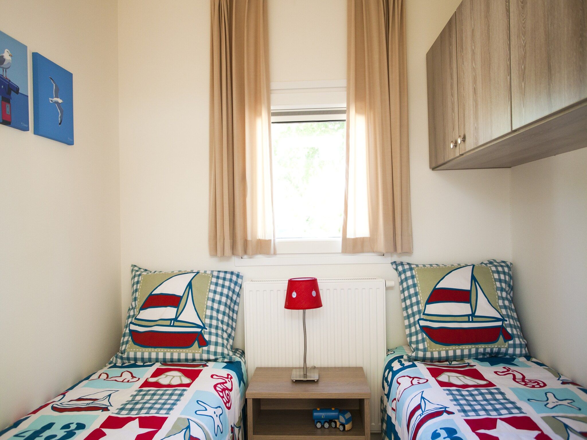 Een slaapkamer van Cabana 4 in Breskens