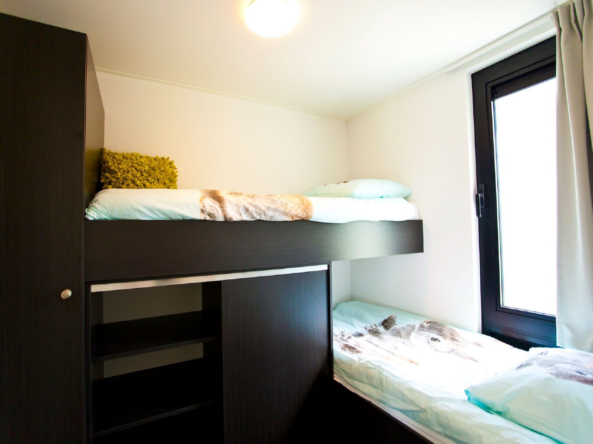 Een slaapkamer van Cube Elite 6 in Breskens