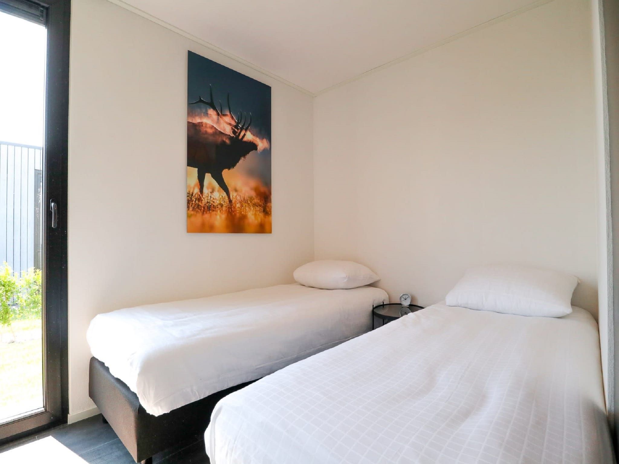 Een slaapkamer van Cube Exclusif 4 in Breskens