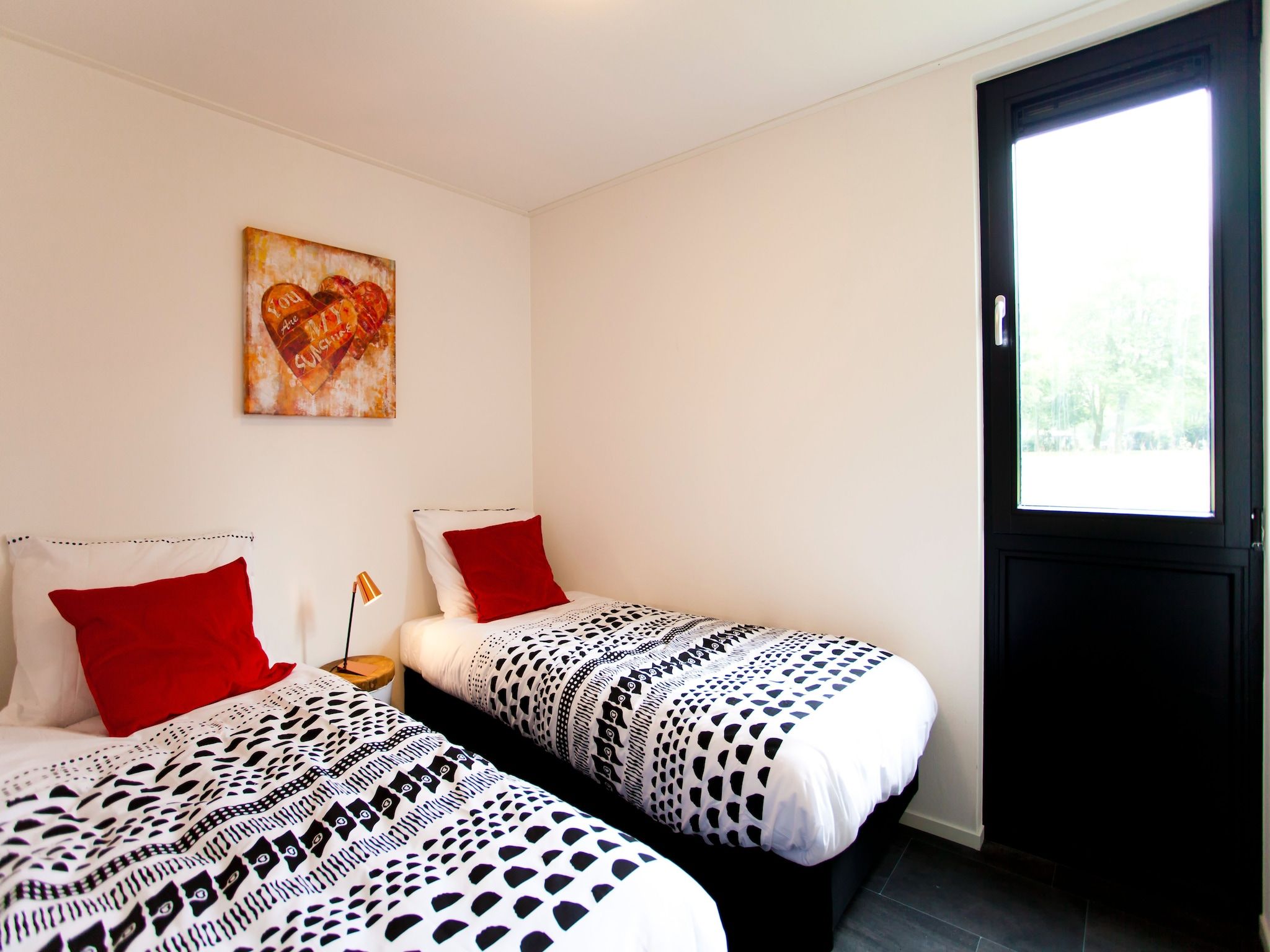 Een slaapkamer van Cube Maximaal 6 in Breskens