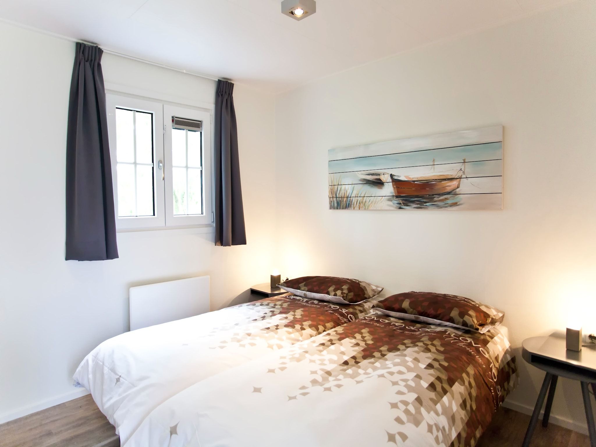Een slaapkamer van Exclusif Plus 6 in Breskens