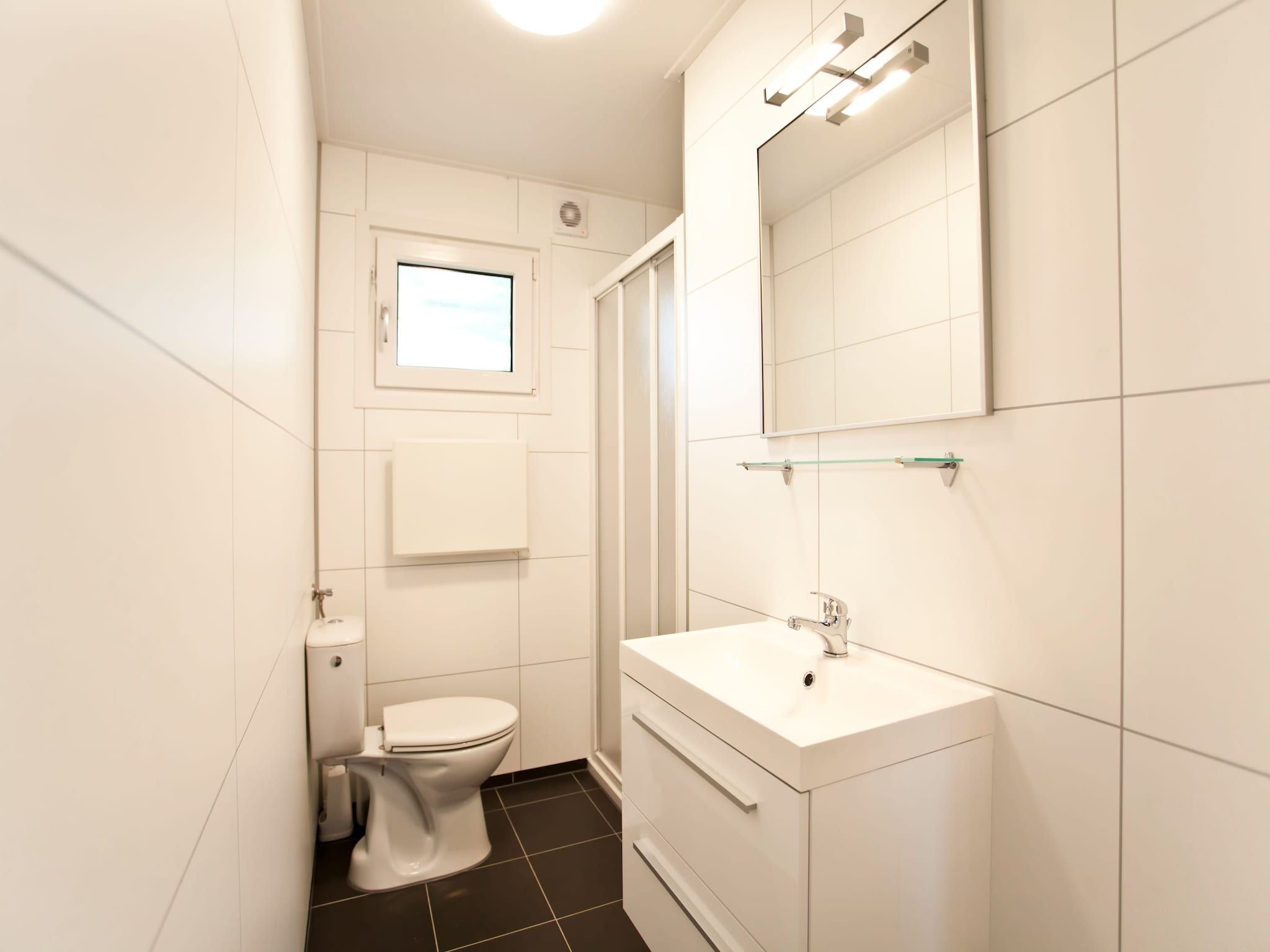 De badkamer van Exclusif Plus 6 in Breskens